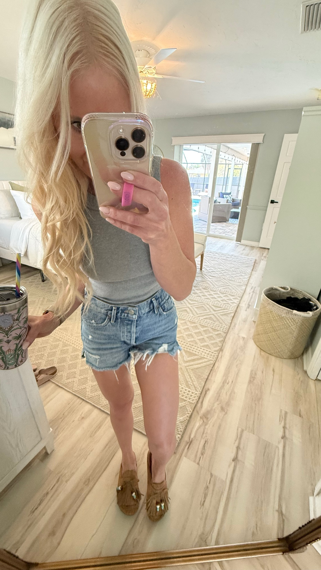 How cute are these beaded moccasin slides?! They are super comfy, on trend and AFFORDABLE and perfect for festival season! I’m wearing a size 7, which is TTS for me. Tank is Free People Kate tank & shorts are old AGOLDE Jaden.

#LTKFestival #LTKootd