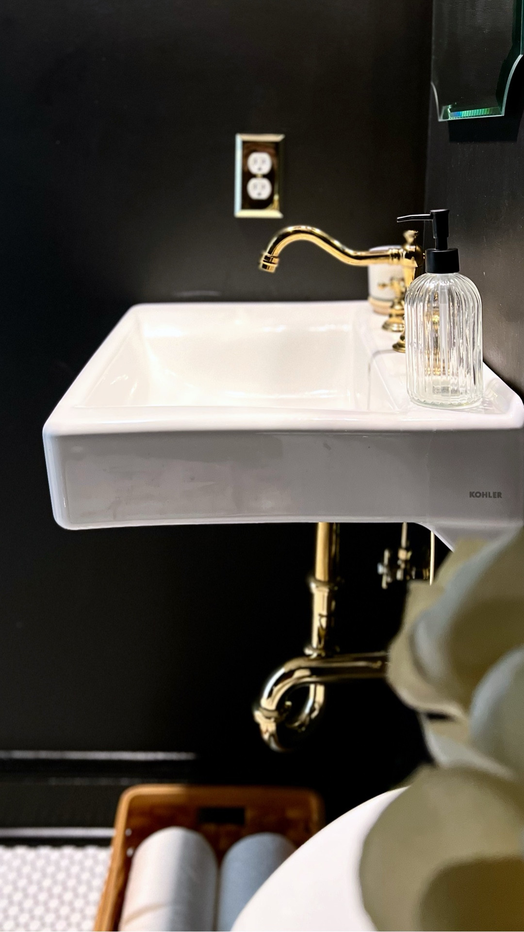 Gold accessories just POP in a black powder room. ✨ Linked all my favorite brass plumbing fixtures  that I buy again & again for all our projects  

#LTKSaleAlert #LTKHome #LTKgrwm