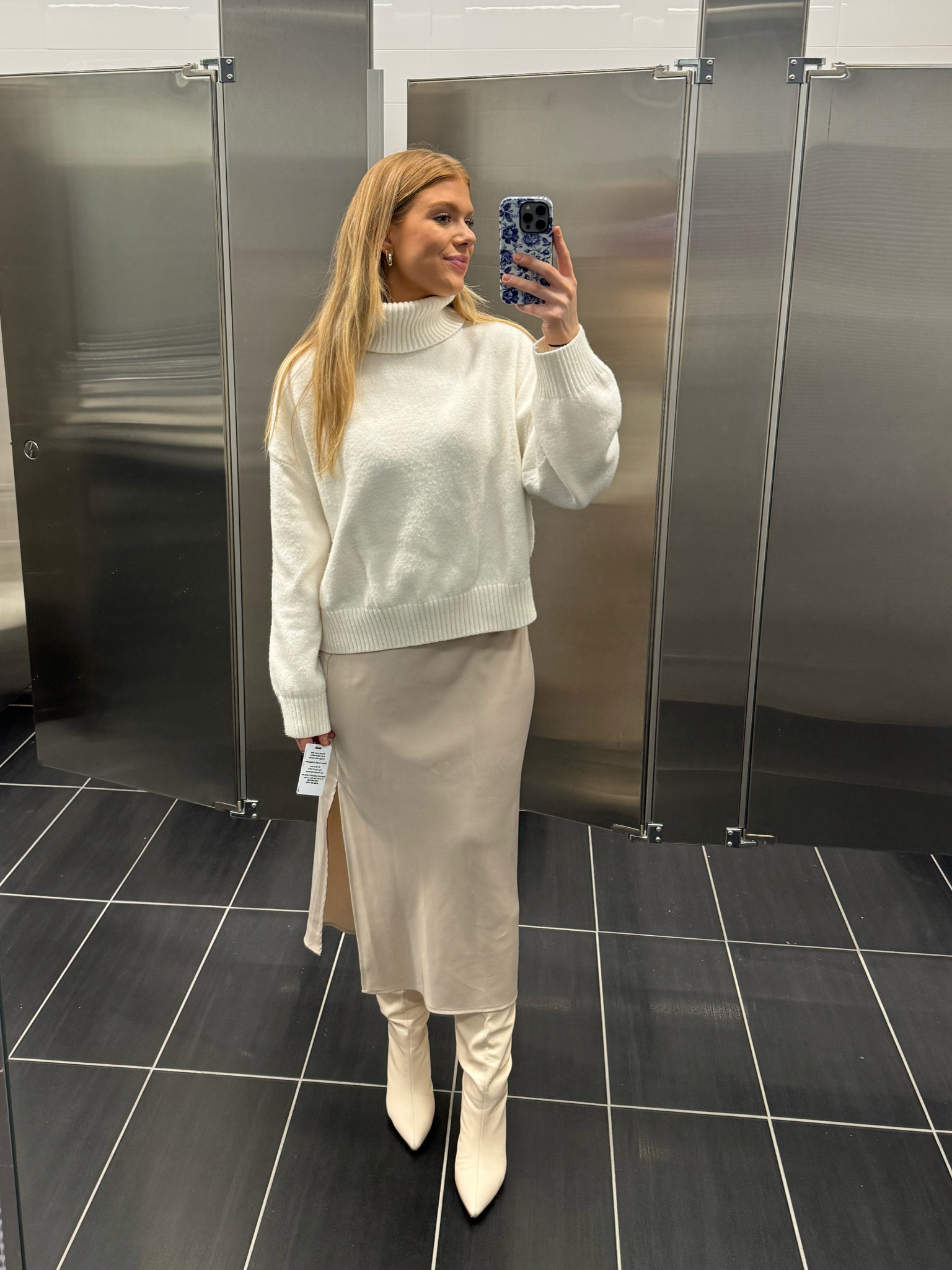 Cream turtle neck sweater paired with champagne silk skirt and cream boots!

#LTKworkwear #LTKstyletip #LTKbeauty
