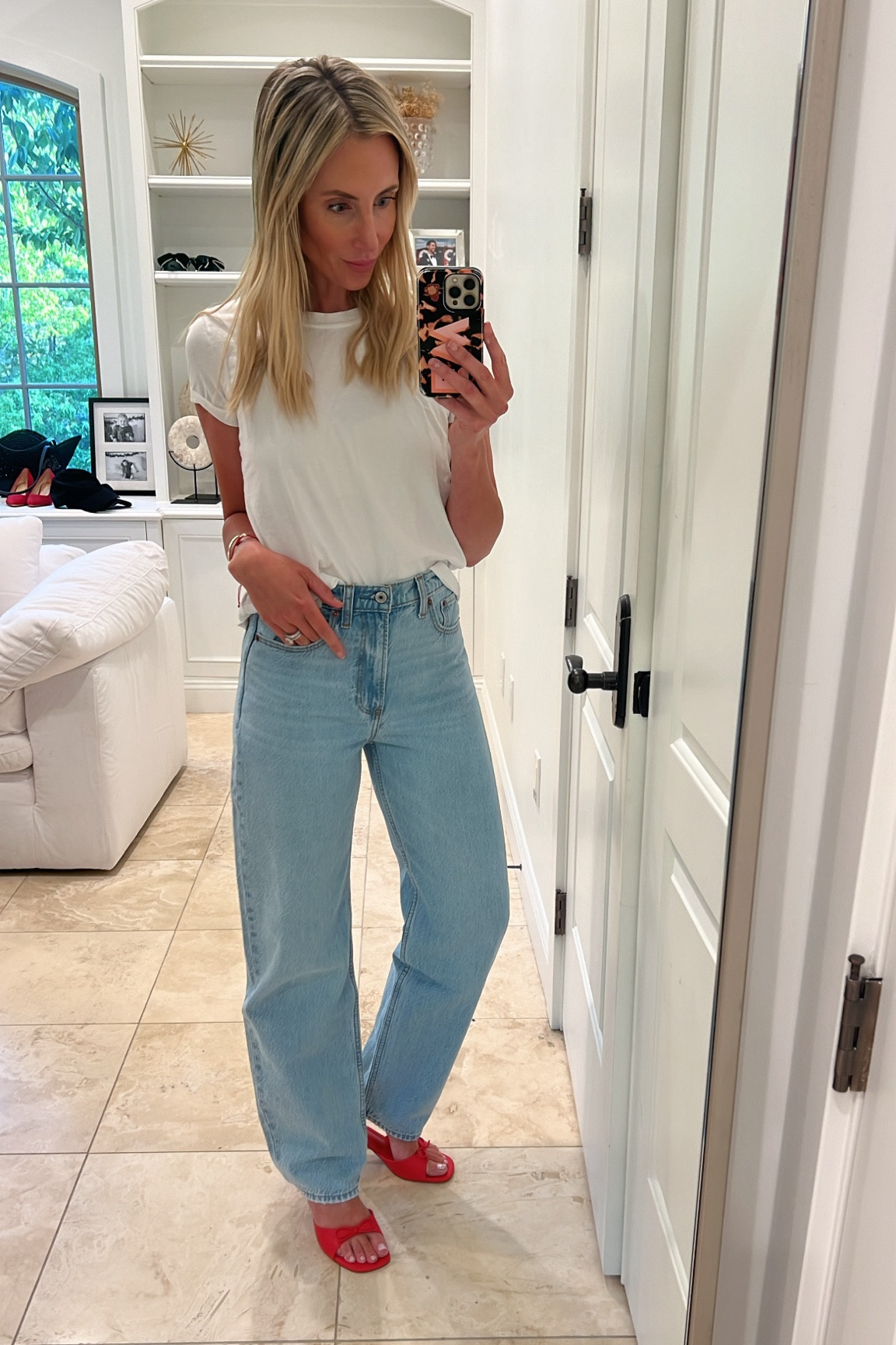 These are the high rise taper loose  jeans and they are my absolute favorites.  Get your normal size. I take the size 25. Use the code: DENIMAF for an additional 15% off. 

#LTKStyleTip #LTKSaleAlert