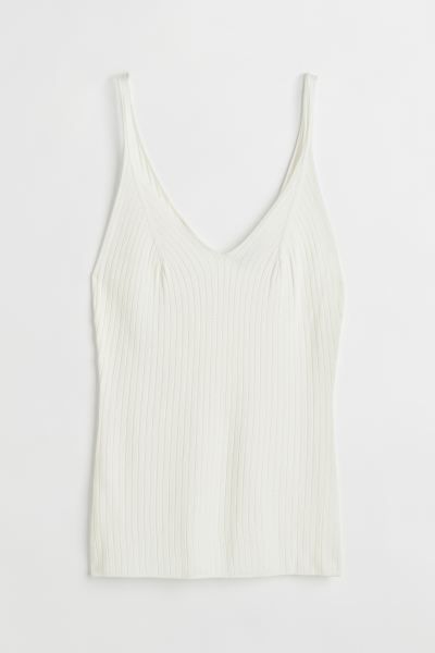 Fitted tank top in a rib-knit viscose blend. V-neck at front and back.CompositionRayon 85%, Polya... | H&M (US + CA)