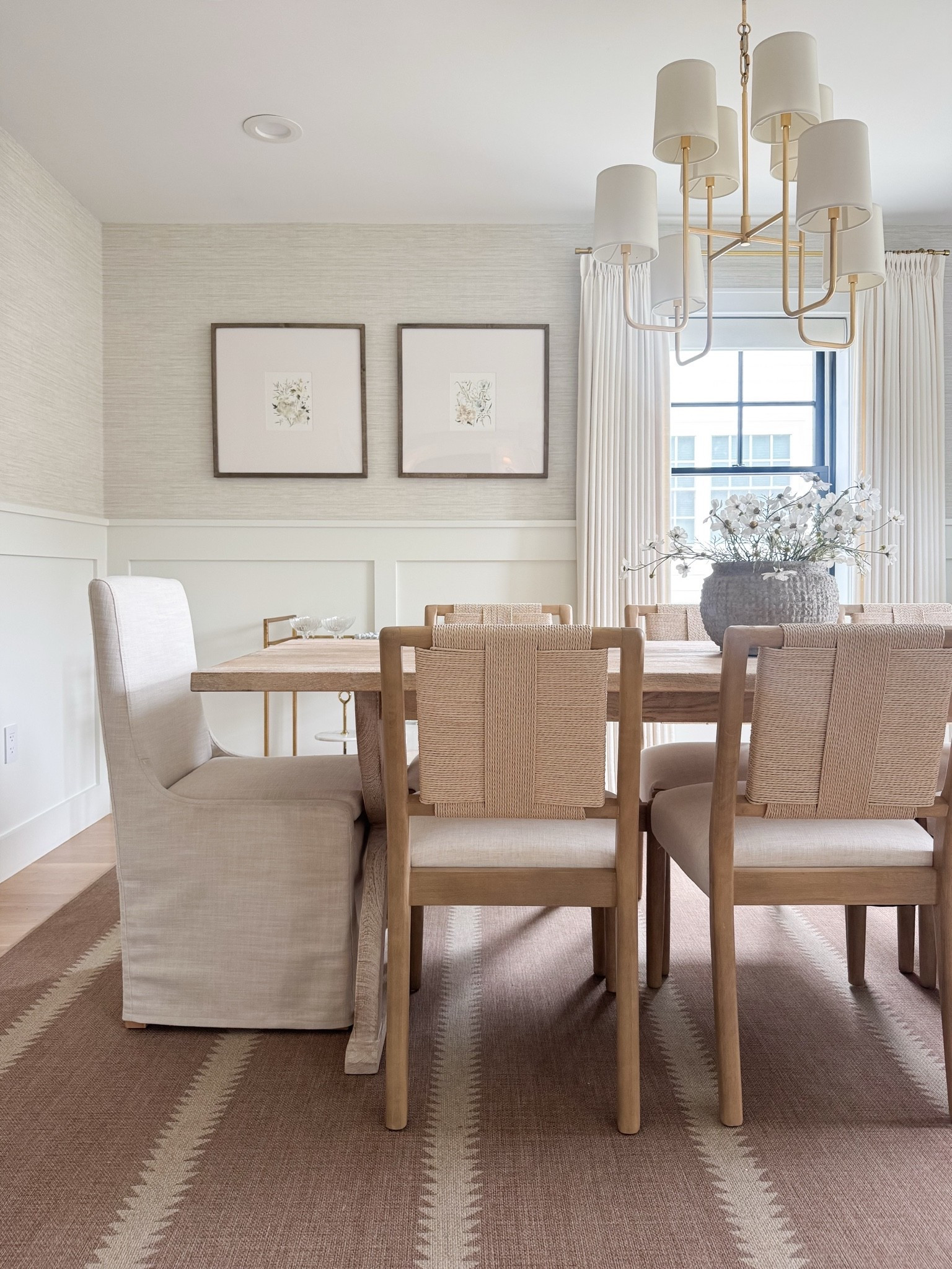 Our dining room 🤍 A mix of pieces I’ve collected and loved over time—the warm wood dining table, woven side chairs, slipcovered host chairs, brass chandelier, and washable  jute rug. I love how the mix of wood, linen, woven textures and warm brass keeps the neutral palette feeling layered, timeless and inviting. Everything is linked!

#LTKSaleAlert #LTKdayinmylife #LTKHome