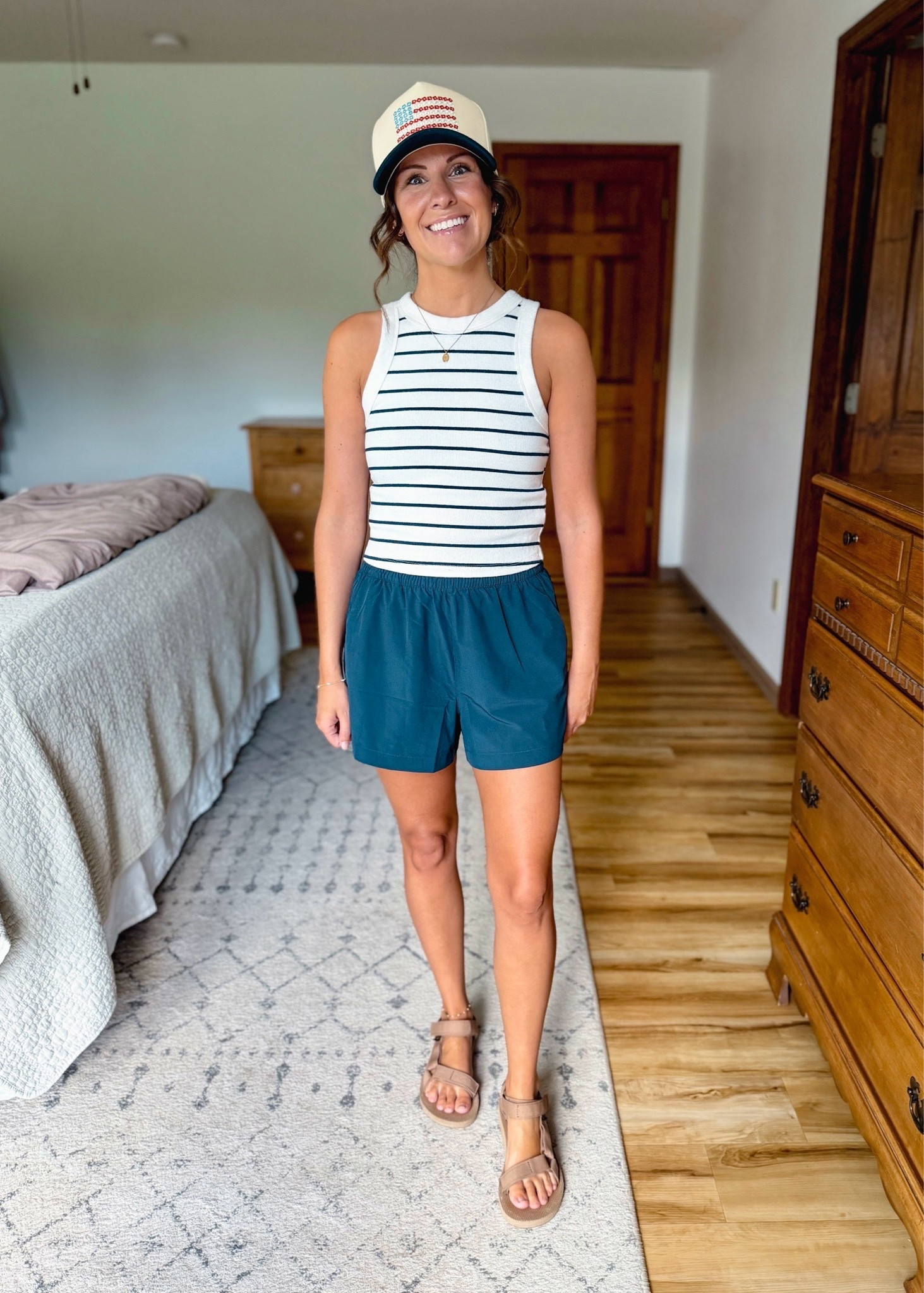 my striped tank is older—linked similar ones. My athletic shorts are size xxs. My teva sandals are size 6.

#LTKPetite #LTKSeasonal #LTKootd