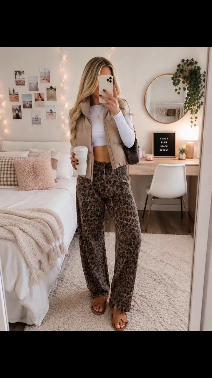 The perfect back-to-school outfit @amazonfindsandfashion  that’s equal parts comfy and trendy! 🤎 This neutral look features a cozy puffer vest, statement leopard pants, and classic tan slides for an effortlessly cool vibe. Whether you’re heading to class, grabbing coffee, or hanging out with friends, these pieces are easy to mix and match all fall long. Shop the full look below! ✨🍂 #outfitsinspo #amazonprime #backtoschoolshopping  🔗ltk bio