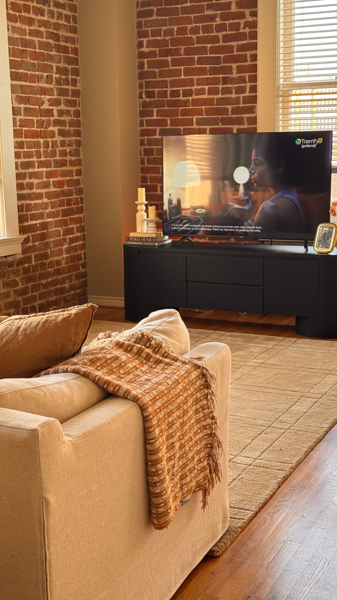 Modern media stand with clean lines + hidden storage. Perfect for a cozy, elevated living room. 🤎

#LTKdayinmylife #LTKSaleAlert #LTKHome