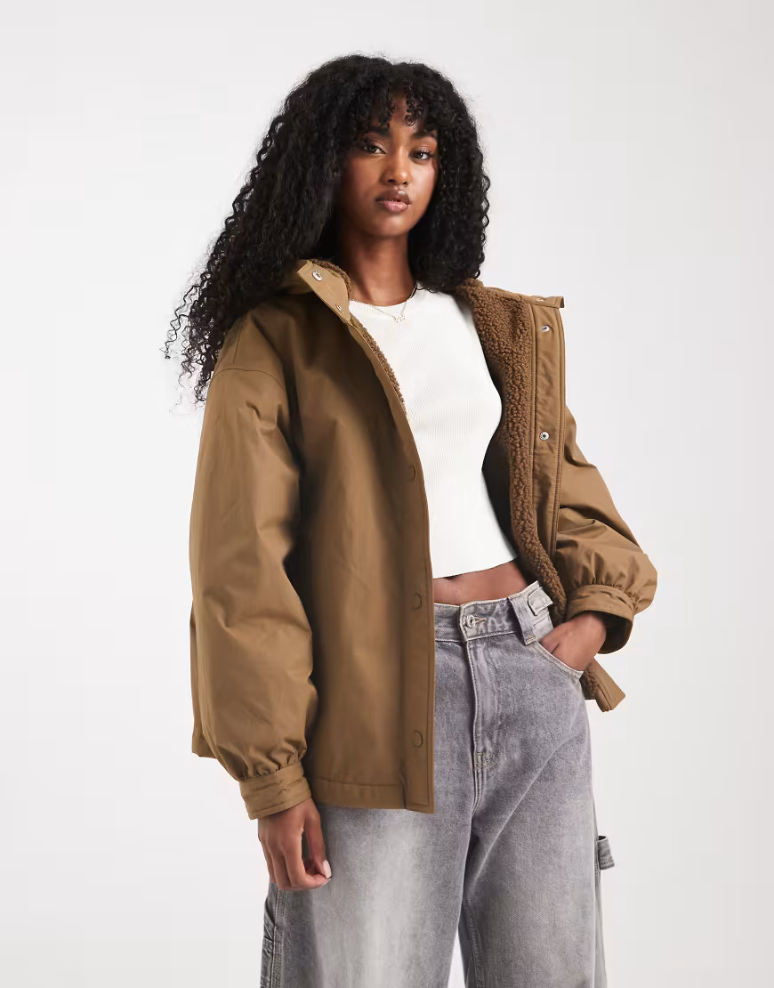 ASOS DESIGN oversized fleece lined rain coat in olive-Brown | ASOS (Global)