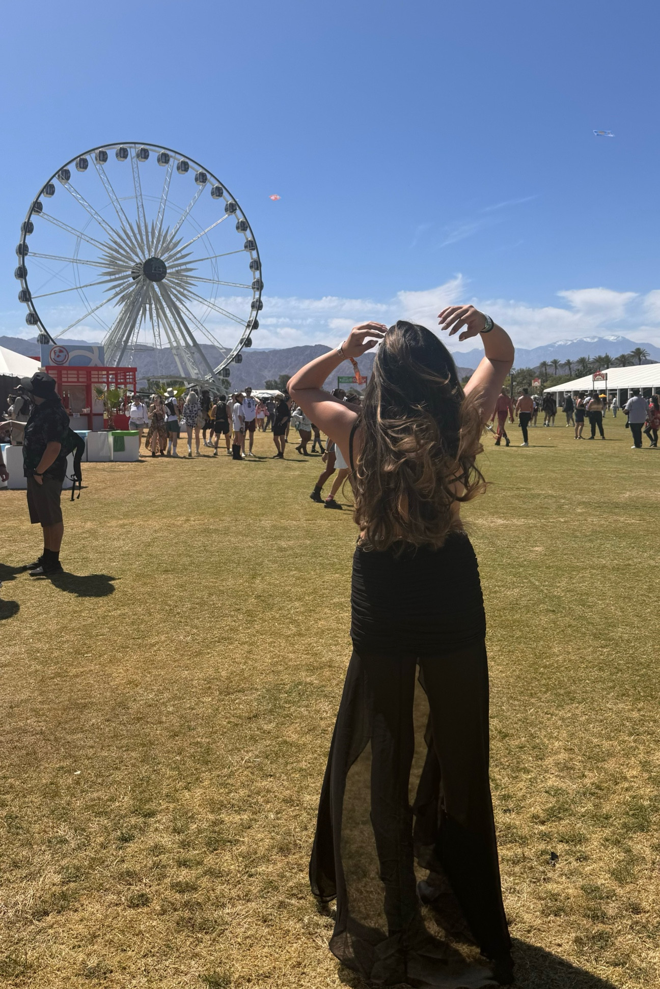 Coachella festival outfit. The perfect black skirt for any festival. Super lightweight and comfortable, high low style. 

#festival #festivaloutfit #festivalclothing #blackskirt #summerskirt 

#LTKFestival #LTKTravel #LTKSeasonal
