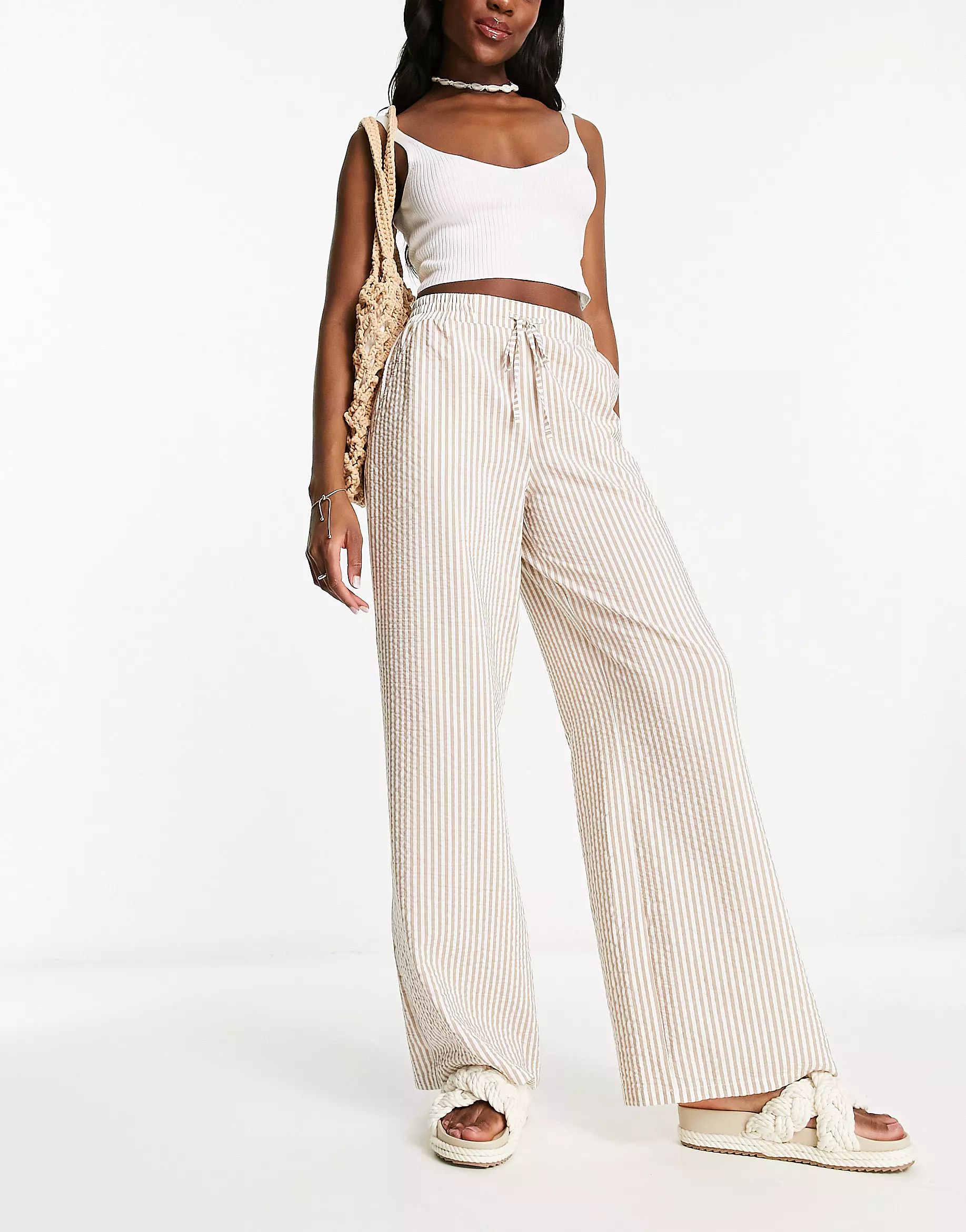 ASOS DESIGN pull on pants in tan stripe | ASOS (Global)