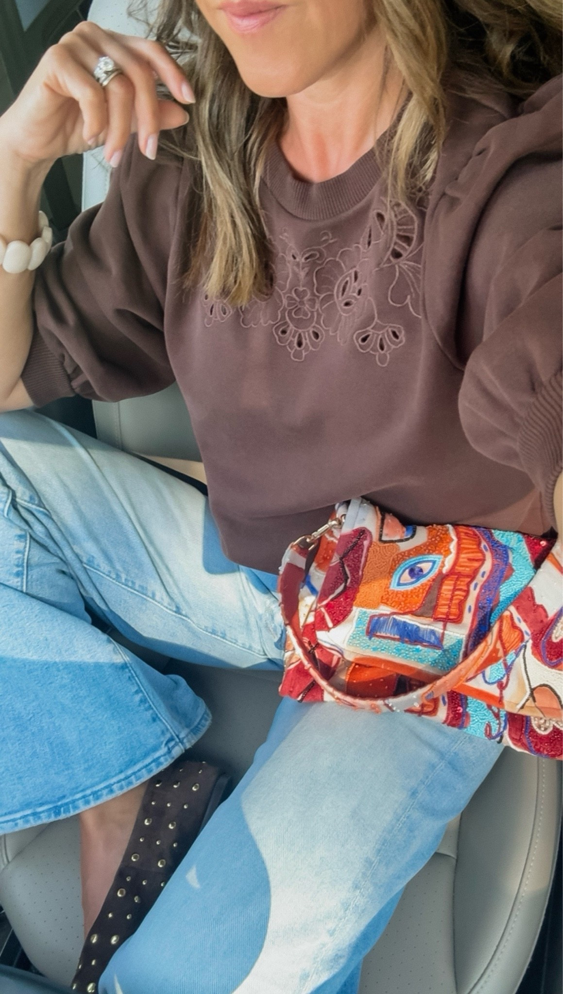 Easy everyday outfit with pretty details. 
XS short sleeve sweatshirt 
Beaded bag comes in a few colors 
Jeans tts, 25

#LTKootd #LTKmomlife #LTKOver40