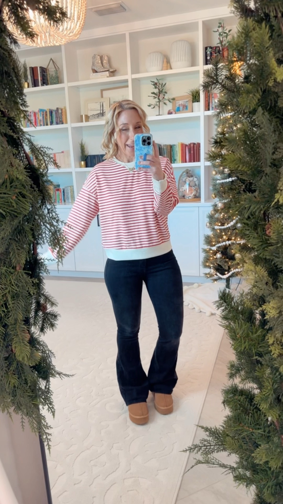 Cozy yet covertly festive Amazon finds:
• Cropped pullover - size Small.
• black flare jeans - size 4, regular length. 
• platform slippers - size up if in between sizes. 

#LTKFindsUnder50 #LTKWatchNow #LTKSeasonal