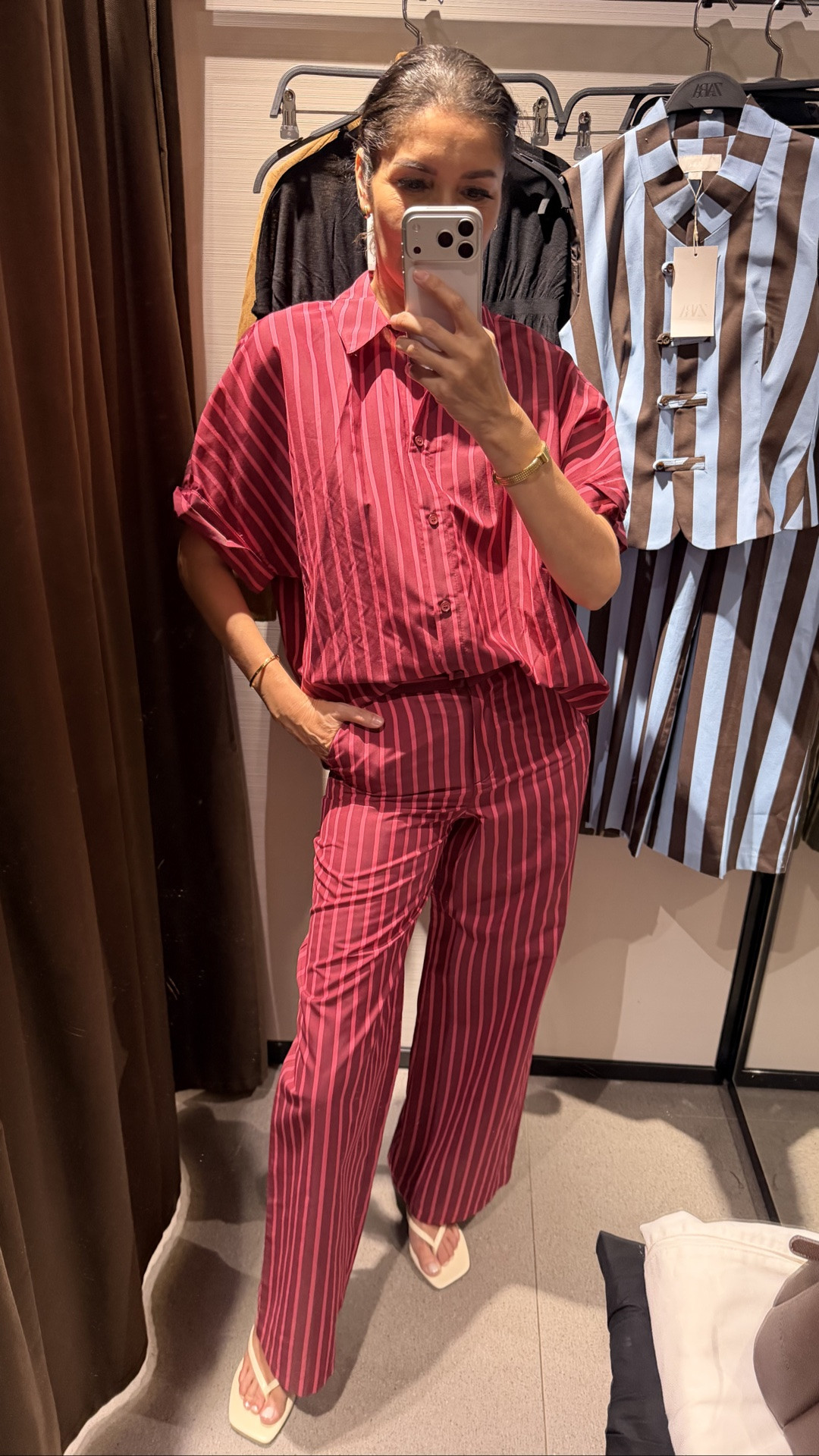 Zara try-on haul ❤️ This striped matching set immediately caught my eye! I love the rich red and pink color combination and the relaxed, effortless look.

A little sizing note because the fit is very different between the two pieces:

➡️ Zara striped top — size XS, oversized fit
➡️ Zara striped pants — size XS, but I need to size up to S because they fit tight through my hips
➡️ White thong sandals — true to size

➫ MY BODY MEASUREMENTS FOR YOUR REFERENCE
Bra: 32C (81 cm)
Waist: 26” (66 cm)
Hips: 38” (96.5 cm)
Height: 5’7” (170 cm)

Zara try on haul | Zara matching set | Zara striped set | striped shirt and pants | Zara new arrivals | Zara sizing | matching set outfit | wide leg pants | Zara outfit ideas | fall transition outfit | fashion over 40 | fashion over 50

#ZaraFinds #ZaraTryOn #MatchingSet #LTKStyle

#LTKOver40 #LTKSeasonal #LTKootd