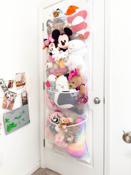 I was thrilled to find this over the door net solution to house Eliza’s stuffed animal collection on the back of her playroom door. There’s also a five pocket version and they are both great for holding other items in the bathroom, closet, bedroom and more! Amazon find playroom storage stuffed animal storage home organization closet organization closet storage 

#LTKhome #LTKfindsunder50 #LTKkids
