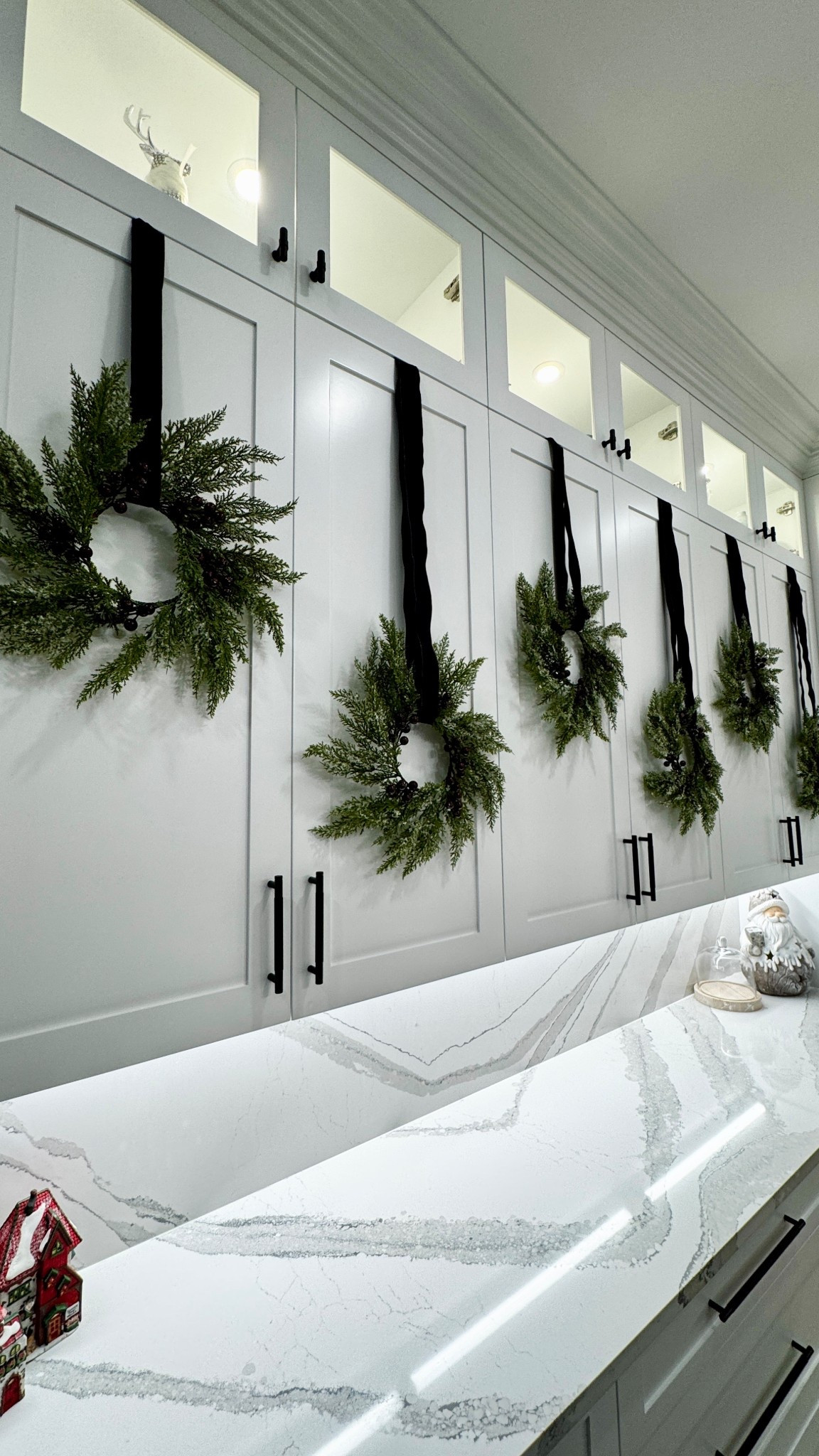 I absolutely love these wreaths on my kitchen cabinets for Christmas! And I get so many compliments. They come with a red ribbon, but I switched it out for black. I had red last year and they looked amazing.

Amazon Christmas Decorations, Christmas Decor, Christmas vibes
Christmas wreath

#LTKHome #LTKSeasonal #LTKHoliday