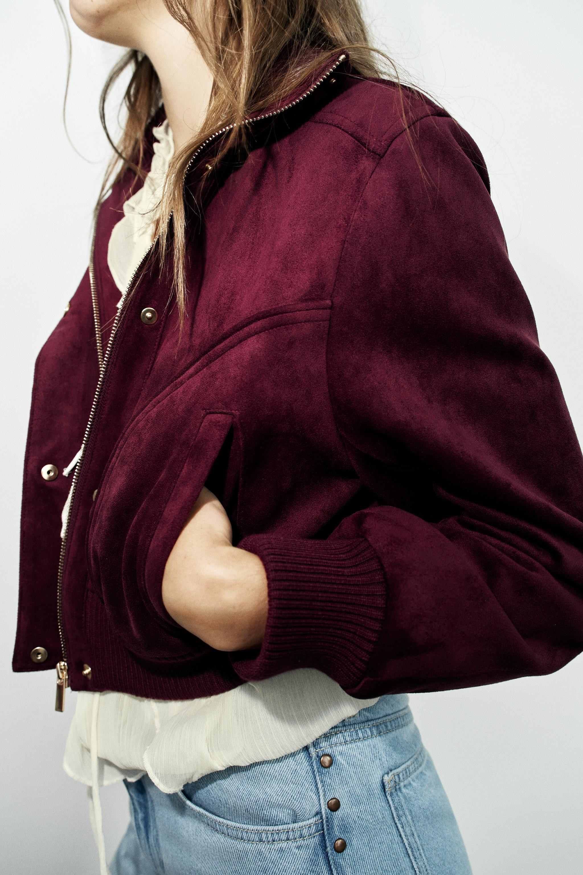 High-neck jacket with long sleeves and cuffs. Front welt pockets. Front closure with zipper and c... | Zara US