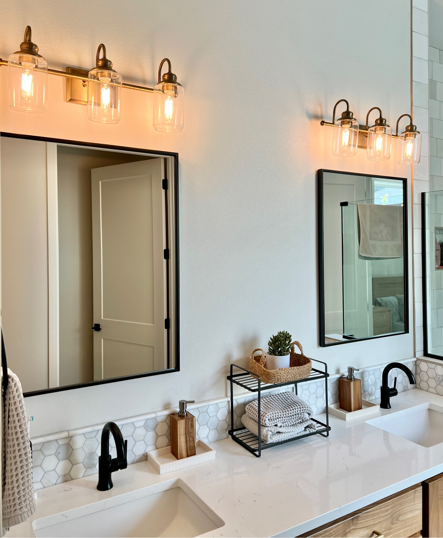 Lighting refresh with @urbanambiancesocial! 

This transformation is stunning. The lighting ads the perfect touch of elegance to our master bathroom!

Shop this and my top favorites in my LTK!

#ad #urbanambiancesocial #urbanambiance 

#LTKHome #LTKgrwm #LTKmorningroutine