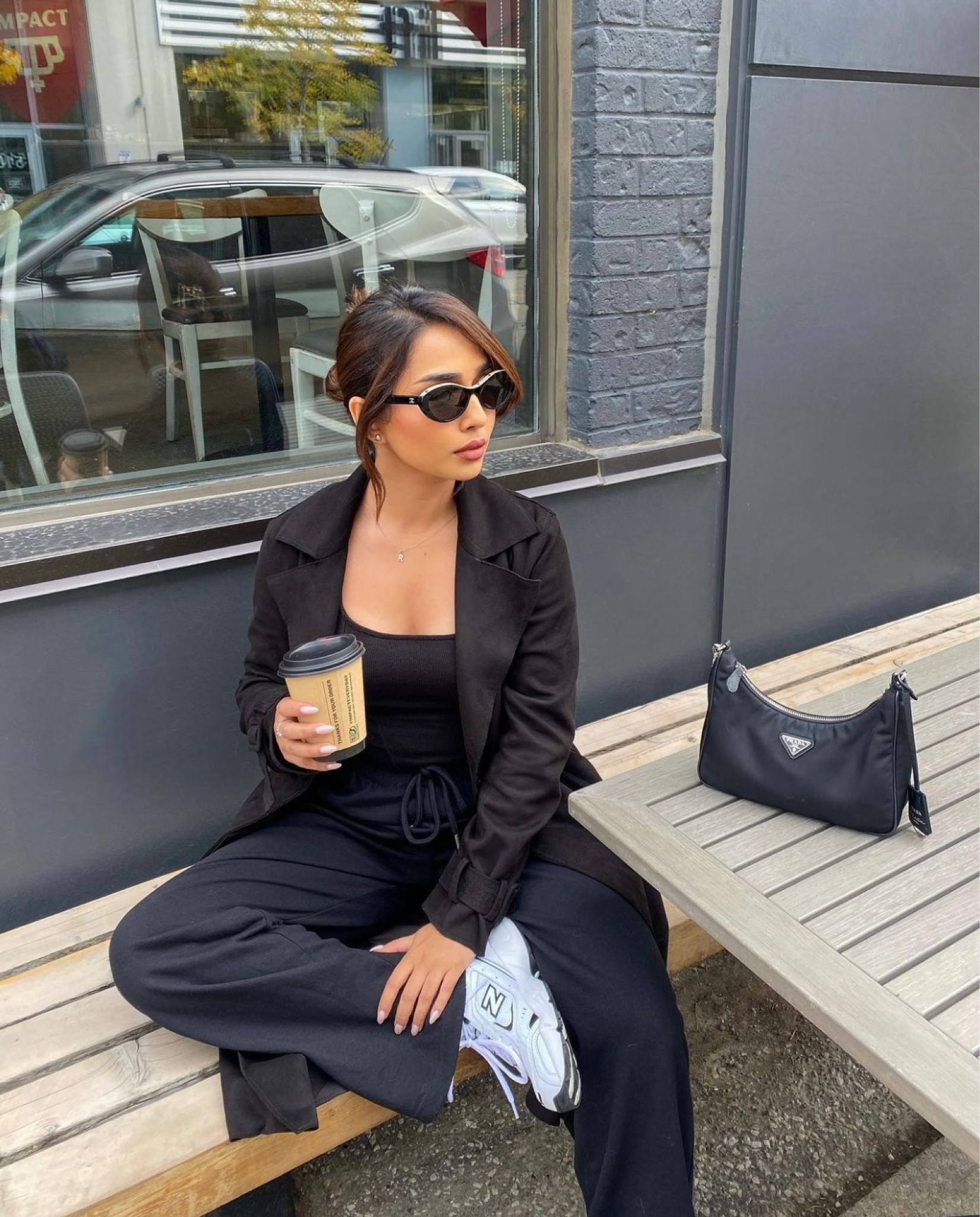 Exact sweat pants are from Garage, Exact bag is from Prada, Exact sun glasses are from Chanel, Exact shoes are New Balance 452, Exact coat is from Zara, Exact top is from Garage. 

#LTKunder50 #LTKstyletip #LTKFind
