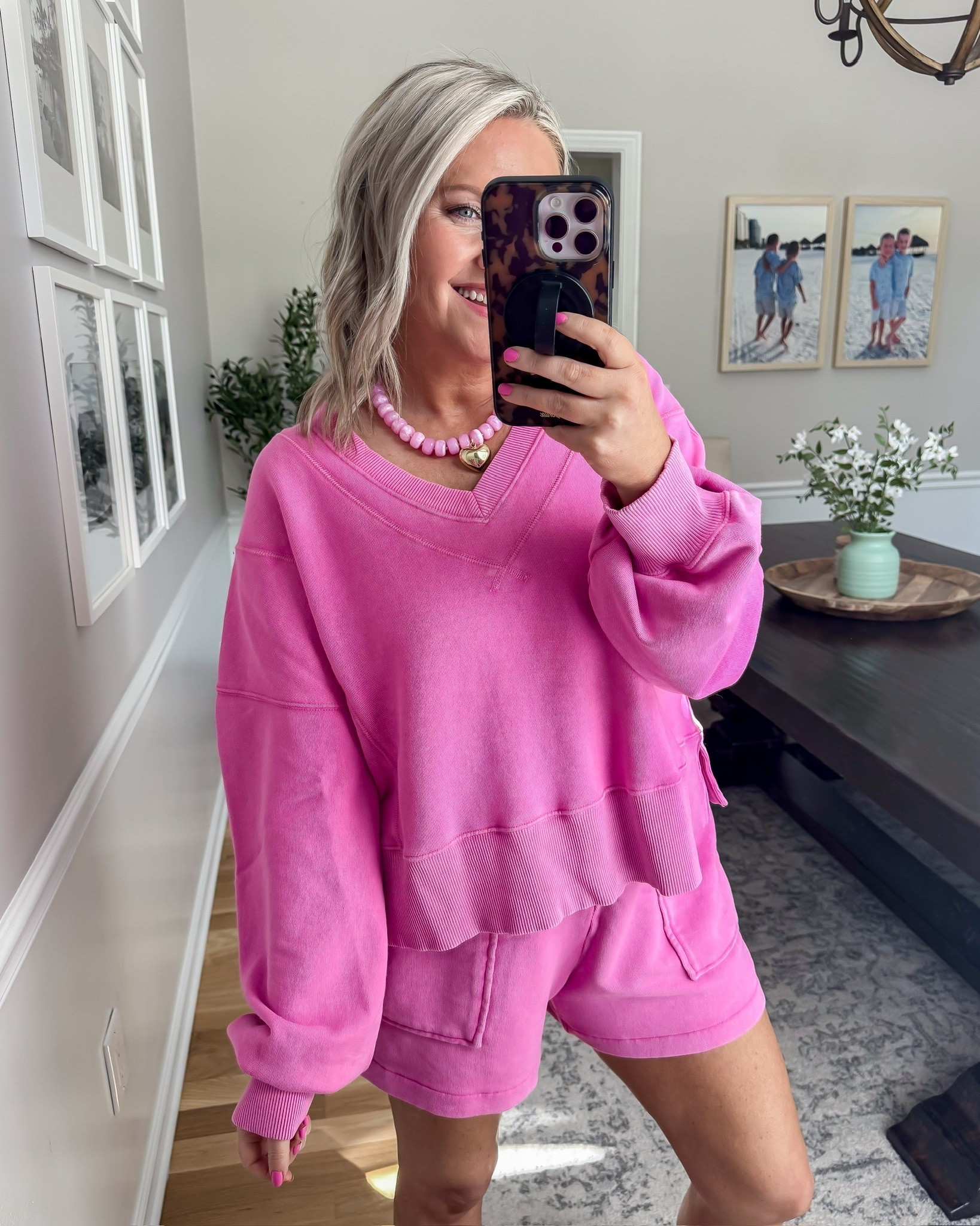 The kind of set you throw on once and immediately want in every color. This bright pink lounge set is oversized, cozy, and still cute enough to wear out for errands, coffee runs, or travel days. The sweatshirt has the best relaxed fit and the shorts are so comfy without feeling too short.

pink lounge set, matching sweat set, comfy mom outfit, oversized sweatshirt outfit, casual everyday style, travel outfit idea, cozy girl aesthetic, comfy shorts outfit, athleisure set, cute loungewear, easy throw on outfit, bright pink fashion, lovelylifestyling

#LTKootd #LTKSeasonal #LTKTravel