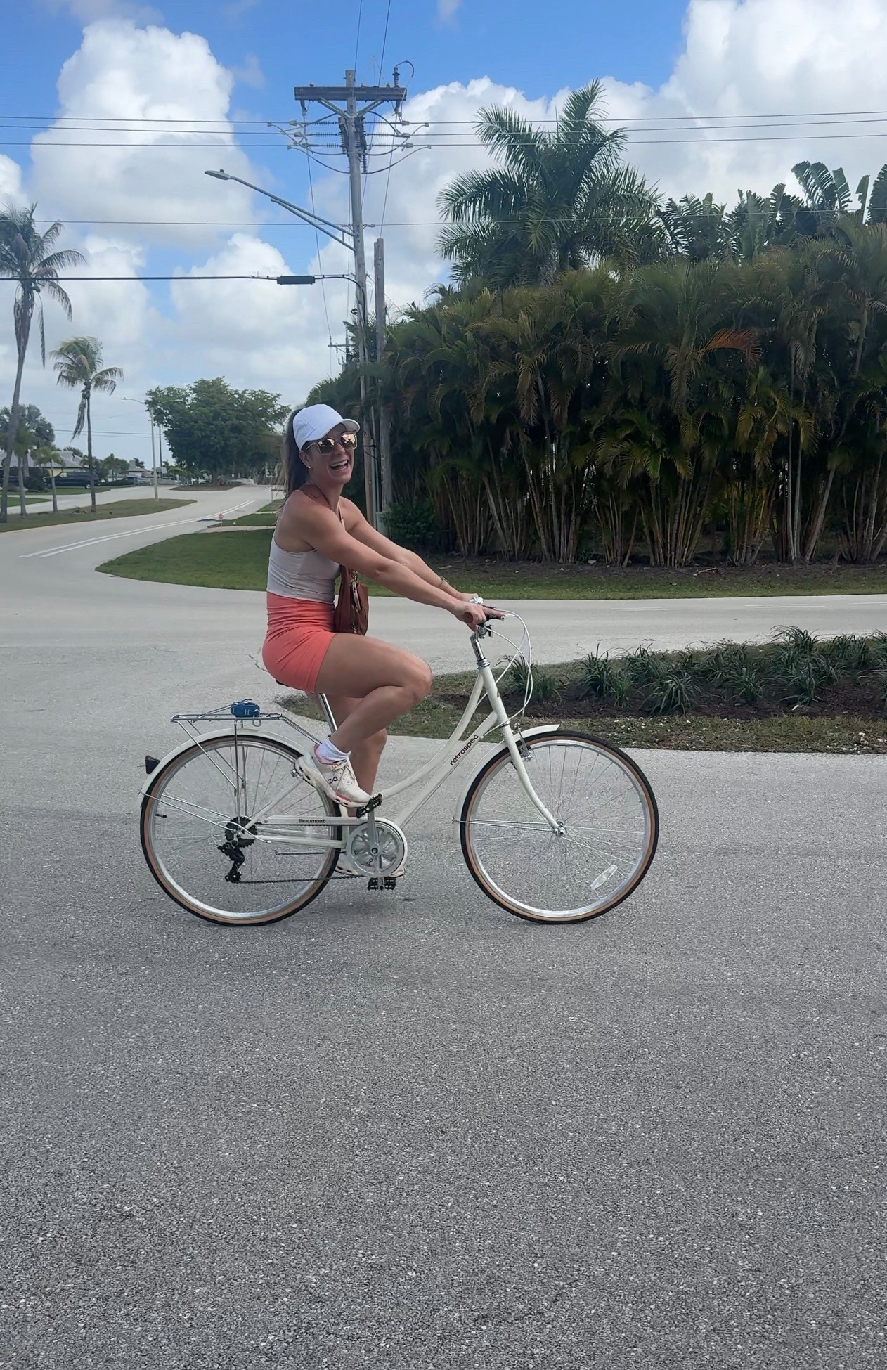 Bike Ride to Lunch 🤍🌴 Essentials:

1.  A hat that allows me to wear my pony tail HIGH 

2. The most comfortable workout top I will be purchasing in every single color (wearing a medium in color nude) 

3. Tried and true oncloud CloudPulse sneakers (size 9) I swear by for lifting in the gym and walking daily Ive owned two pairs and am due for a third pair as I’ve worn them out

4. Wireless waterproof shatter proof Bluetooth speaker - such a great speaker for $20!!!! 

Love my new Retro Soec Bike. Please share your bike basket recommendations 