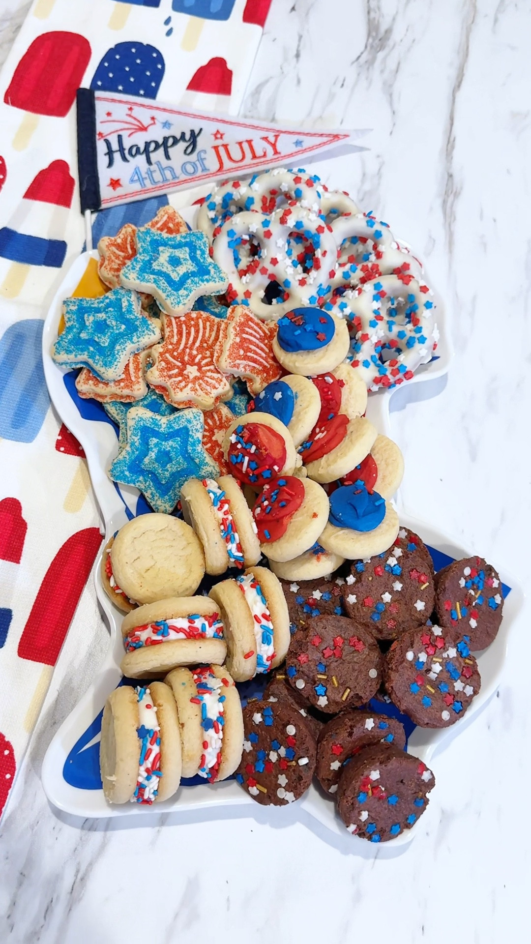 Red, white & sweet! 😍🧁🇺🇸🍪✨🧨🍫⭐️💙

I made this cutsey dessert board full of all the soft blues, creamy whites, and all the sweet little treats for this Fourth of July! 

#LTKHome #LTKParties #LTKSeasonal