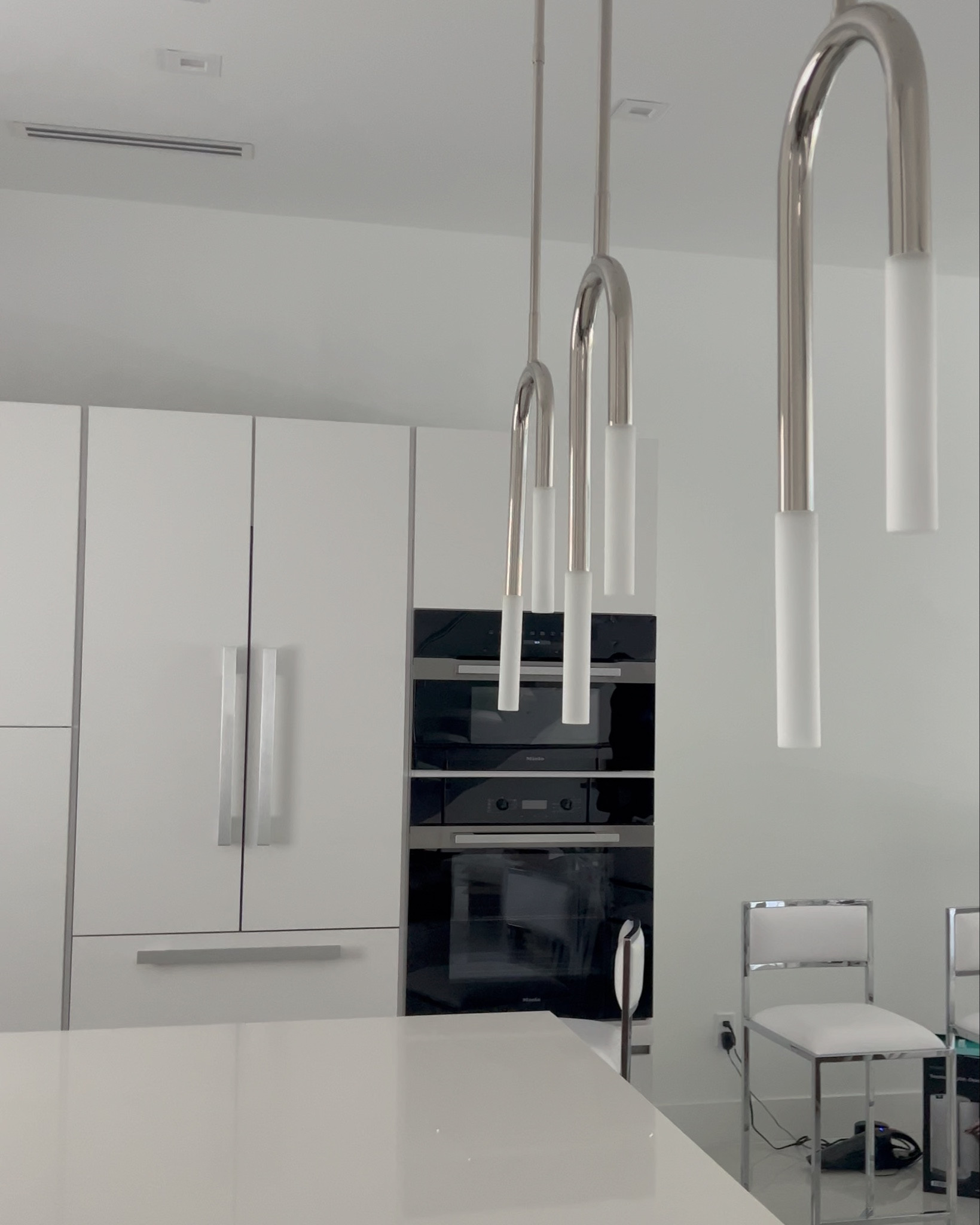 Are you ready to update your kitchen island pendants? These work fabulous in a powder room as well (think caddy-cornered above a vanity). I changed these pendants out for my client today. What do you think? Check out the before fixtures (the globes), yikes! lol - love my clients and love how they trust me 😻 

#LTKhome #LTKstyletip #LTKVideo