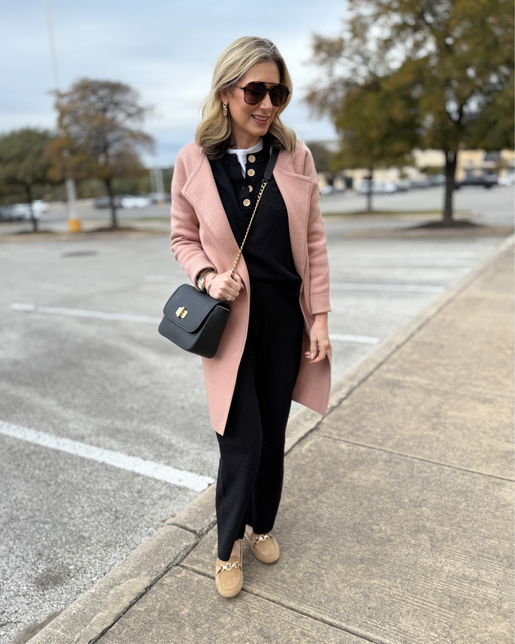 Sharing a few behind the scenes pictures of getting the outfit shot. It was a grey, chilly day and I wanted to be cozy for our brunch date, then a run to some local stores to find gifts for our Angel Tree recipient. Her wish list, in this order, was a winter coat (that broke my heart), art supplies and a Barbie. We got everything checked off her list and then went home to film an Amazon haul-and this outfit just happens to be Amazon from head to toe! 

I layered one of my favorite waffle knit sets over a basic tee, then layered that under a khaki coatigan to break up all the black. Added my faux suede loafers and Riley handbag and it was a look I really liked! I think this would make a great travel outfit too! Use code MARNIE20 to get 20% off my bag before prices go up in January!

#winteroutfit #falloutfit #cozyoutfit #traveloutfit #fashionover50 #knitset #twopieceset #amazonfashion 

#LTKShoeCrush #LTKOver40 #LTKItBag