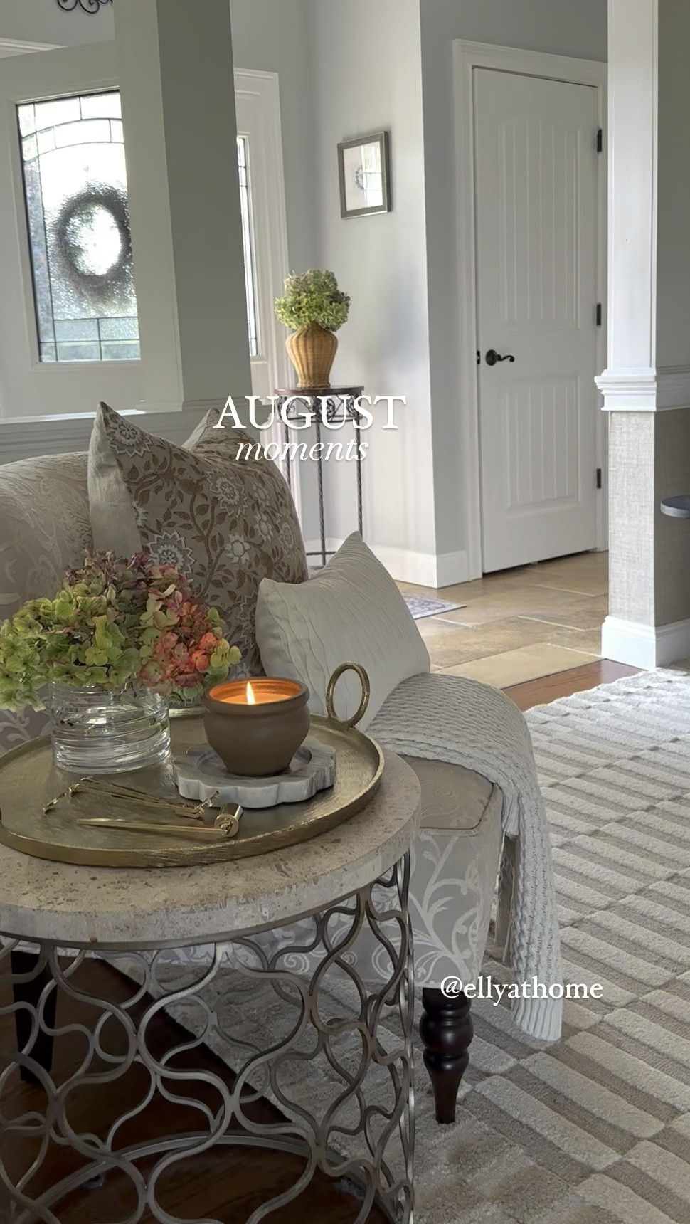 Late summer, early fall entryway, foyer styling. Shop fall scented candles, fall florals, vases, neutral area rug, black accent table, candleholders, accent chairs, tables. Early fall home decor accessories. 

#LTKVideo #LTKHome #LTKSaleAlert