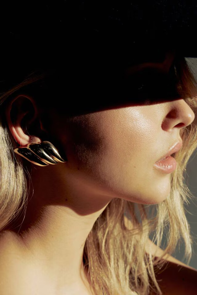 Large 90's Winged Button Earrings | Dynamite Clothing