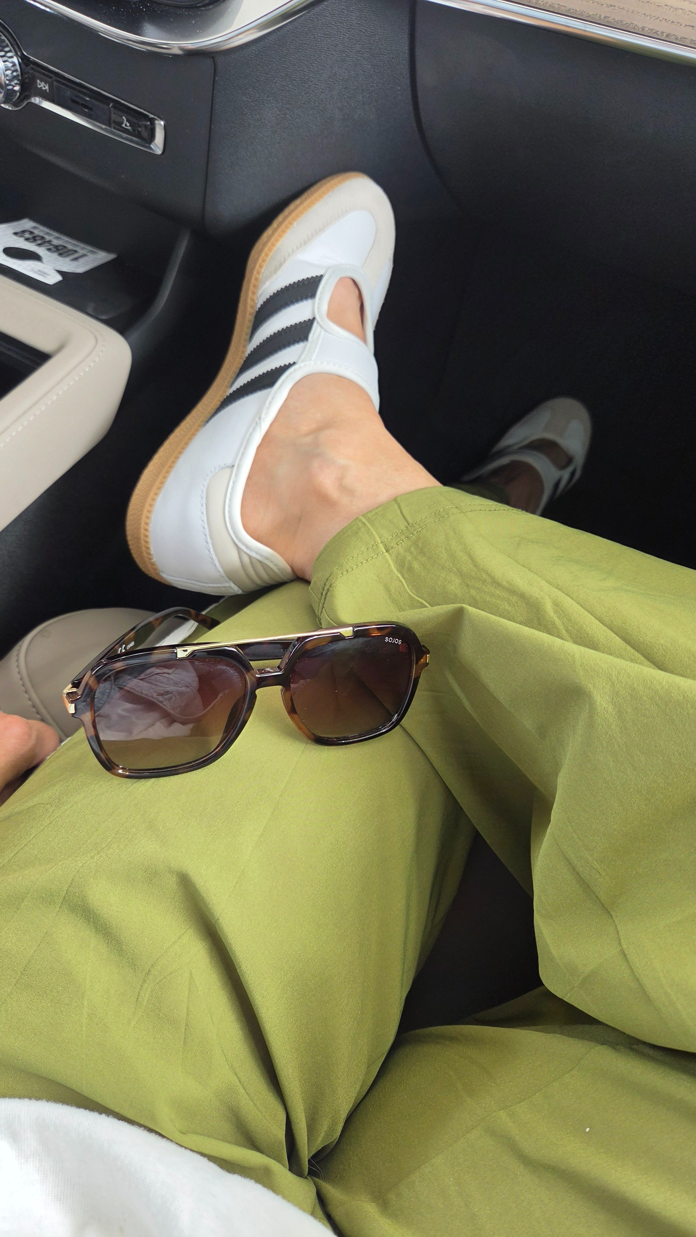 The comfiest travel fit of the day, wide leg lace side striped track pants, Samba Jane's and my Sojos Sunglasses. 

#LTKTravel #LTKOver40 #LTKootd