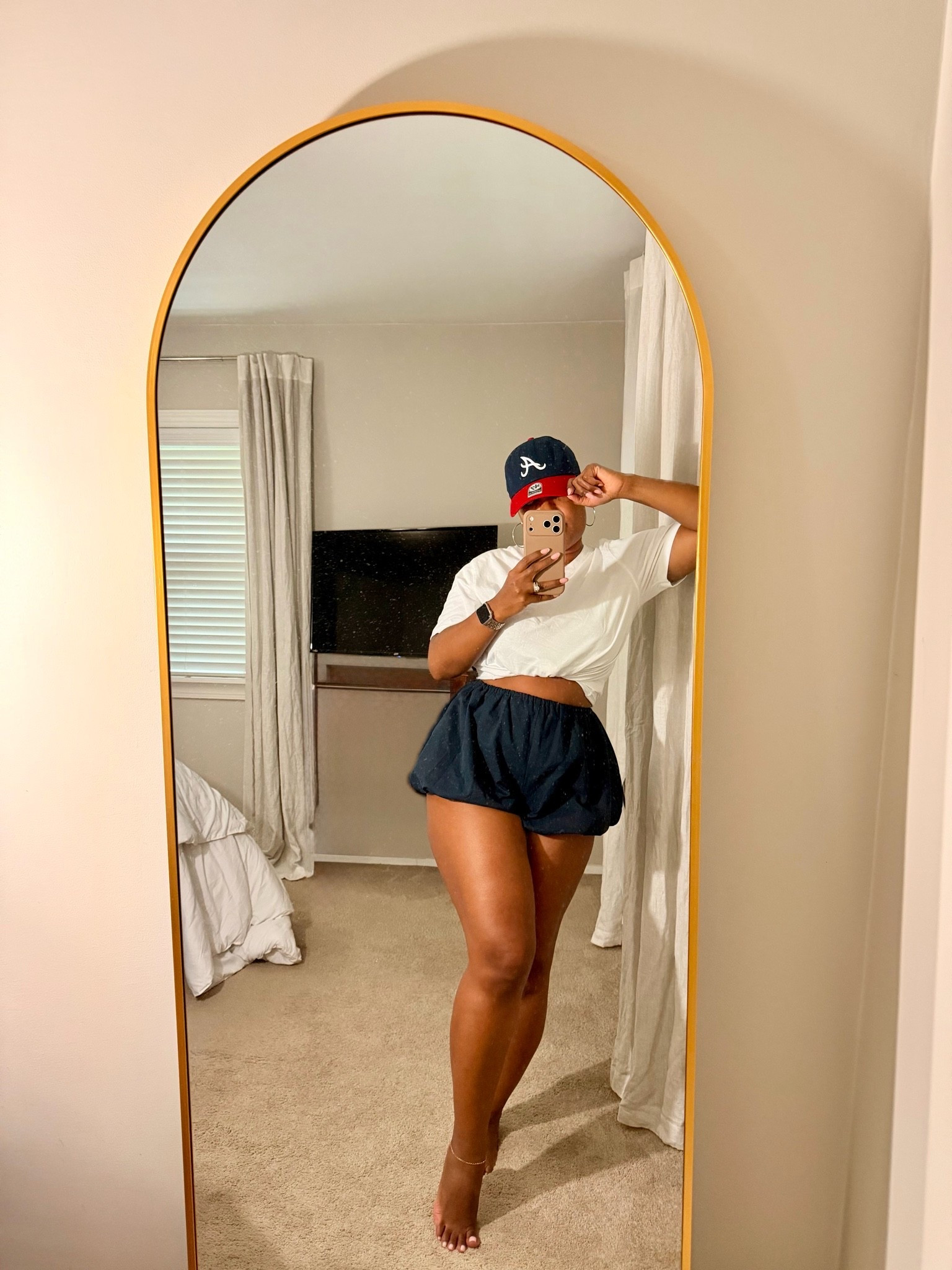 Cheeky outfit for a sports game or concert wearing the shorts in size M they fit true to size and are very short 

White t-shirt and shorts outfit 
Baseball game outfit

#LTKSeasonal #LTKOver40