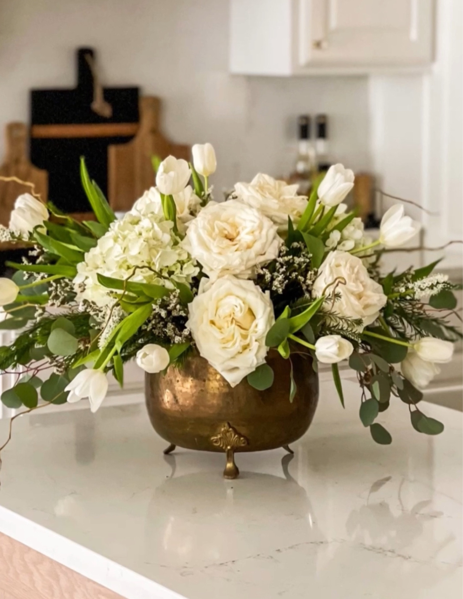 Brass pots, brass garden pot, brass pedestal bowl, brass flower arrangement, brass vase 

#LTKhome #LTKfindsunder100 #LTKfindsunder50