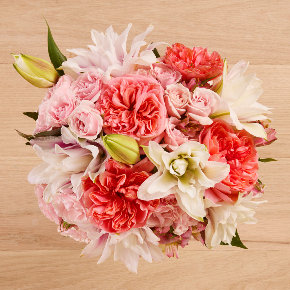 Mixed Pink and Peach Rose Lilies w/ Garden & Spray Roses - The Bouqs Co. | The Bouqs Co.