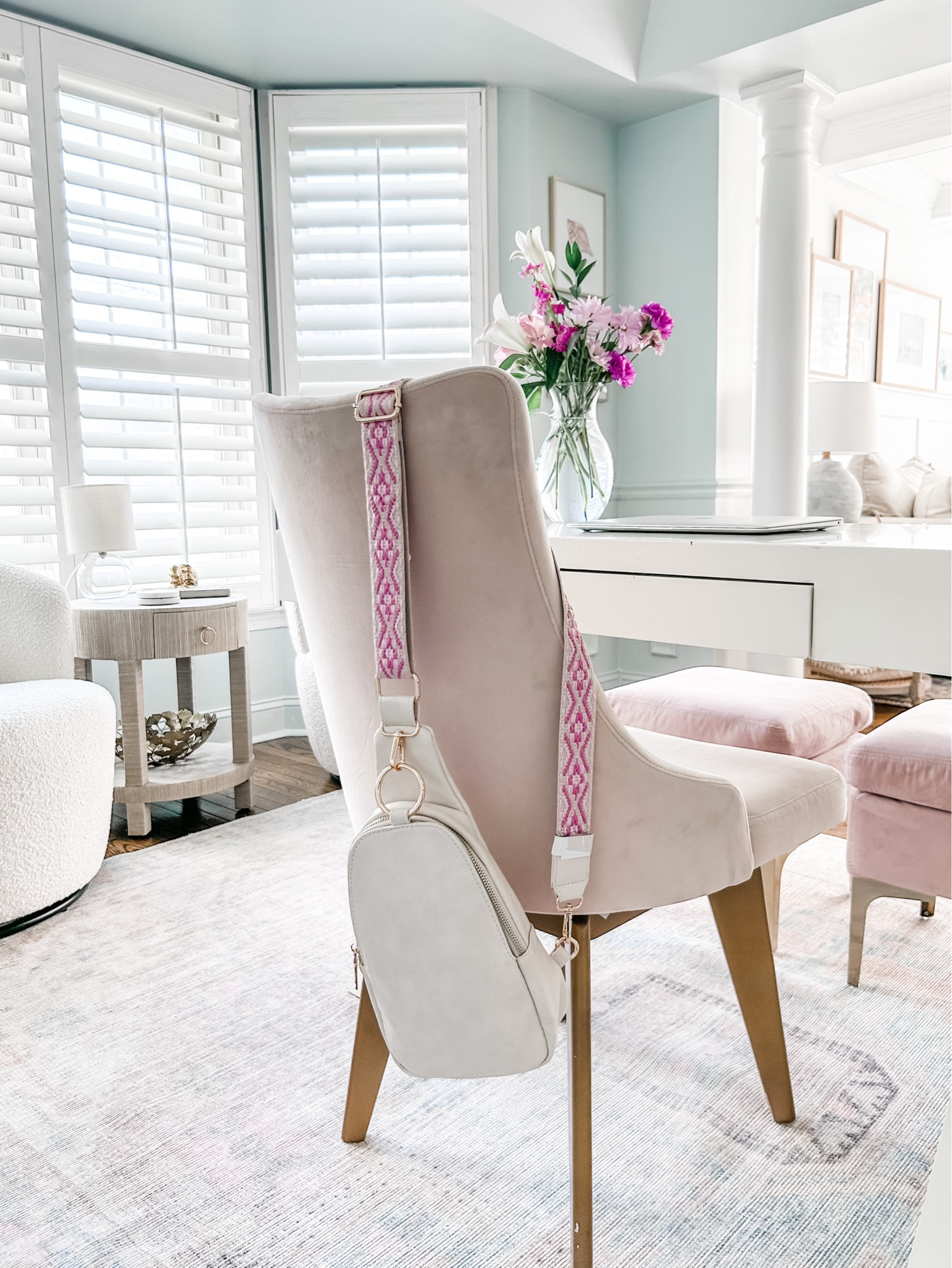 Obsessed with my new guitar strap sling bag from Altar’d State! 
It has two zippered compartments and large main opening big enough to fit my full size wallet.

Home office decor, desk decor, pink velvet dining chair, blush chair, swivel chair, bouclé chair, raffia side table, round end table, woven table, neutral decor, blush area rug, home office area rug, transitional area rug, white desk, white x-leg writing desk. Purse, sling purse, pink sling bag purse. Bone color purse. 
Coastal art print, mini lamp, glass lamp, gold picture frame.
#purse #bag #homedecor

#LTKFind #LTKhome #LTKitbag