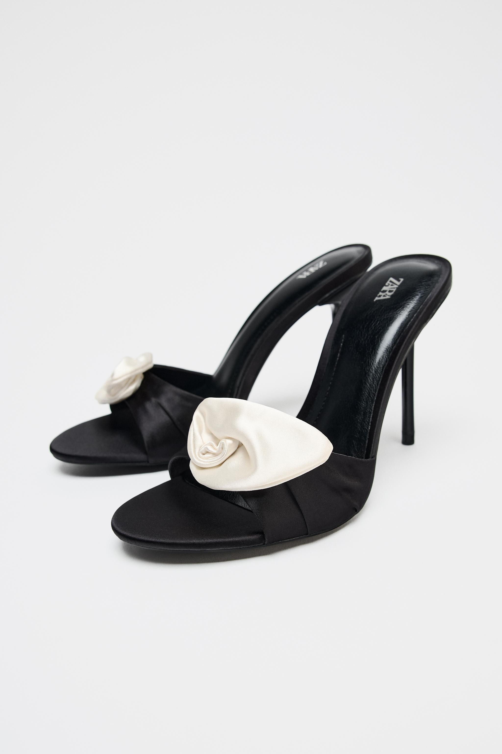 Satin-effect heeled sandals. Mule style. Strap detail with flower at the front. High stiletto hee... | Zara US