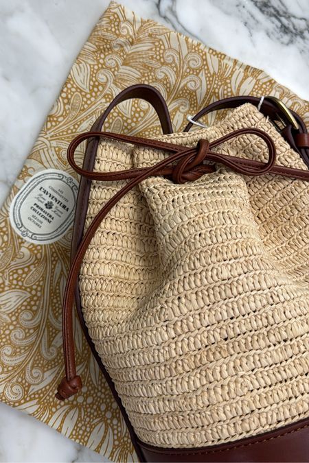 Sezane raffia bucket bag. Perfect in every way. 

#LTKover40 #LTKtravel #LTKitbag