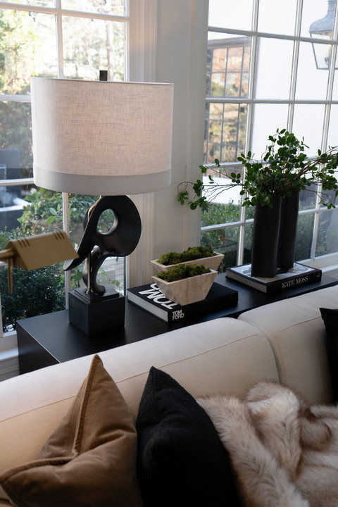OKAY I am literally freaking out over this living room window seat right now!! The neutral sofa, layered pillows, sculptural lamp, stacked coffee table books and greenery look SO GOOD together. The natural light makes everything glow and the whole space feels cozy, bright and insanely designer level beautiful. I cannot stop staring!!  

 #LTKSeasonal #LTKHome #LTKSaleAlert