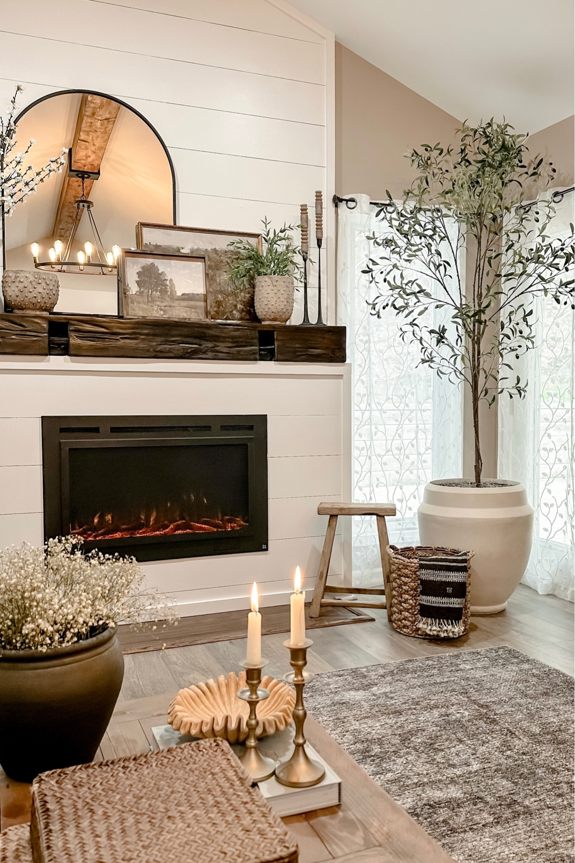 7’ Amazon Olive Tree. Follow @farmtotablecreations on Instagram for more inspiration. Amazon Finds. Living Room Decor. Fireplace Mantle. Mantle Decor. Large 23” Planter. Modern Wool Throw use code KELLY50 for 50% off  

#LTKunder50 #LTKFind #LTKhome