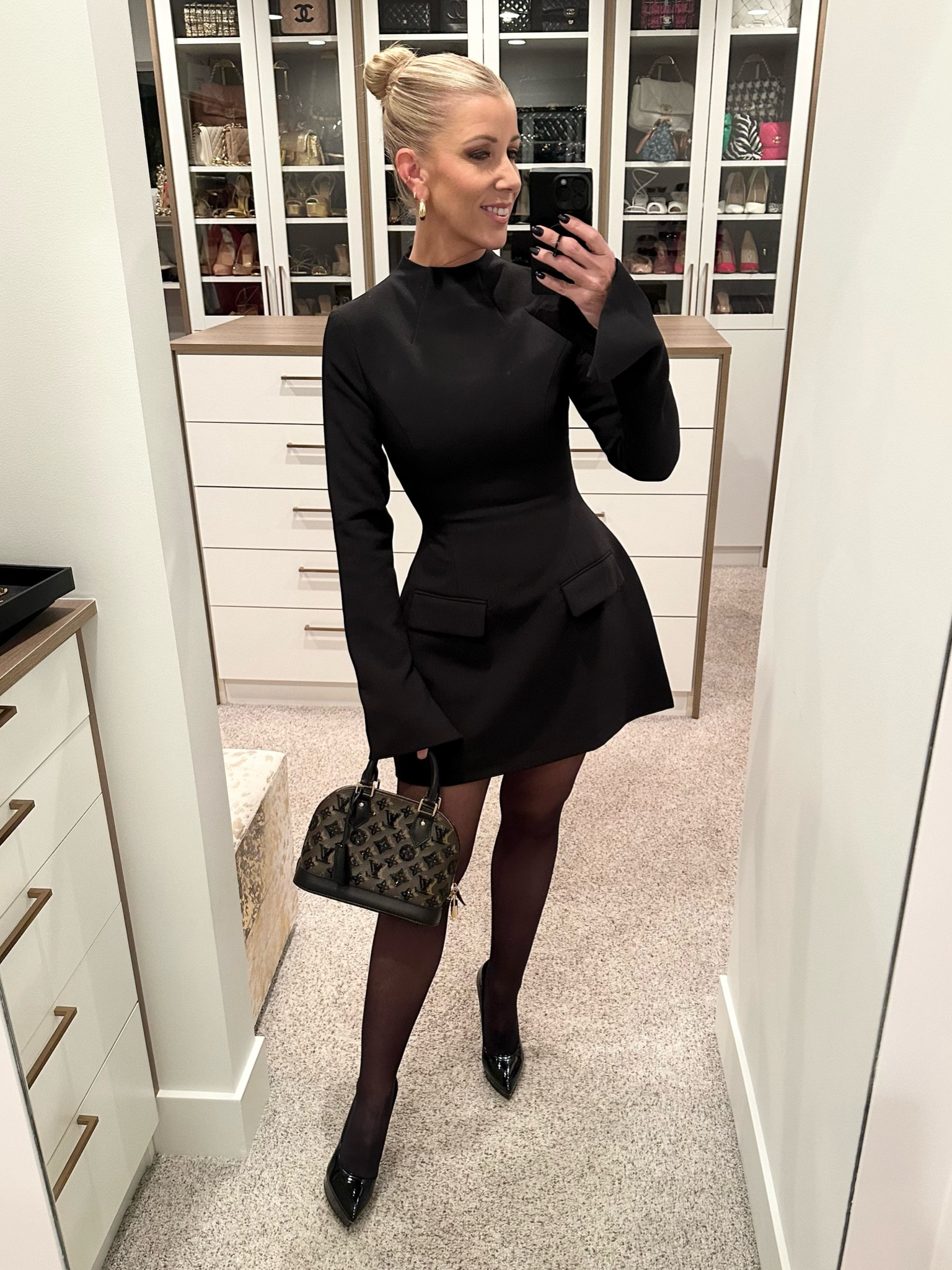 Finally had a chance to wear this dress. I am in a size XS. It’s pretty snug and there is not much stretch so it may make sense to size up and have it altered to fit you. I’m wearing Noosh tights in sheer and Saint Laurent heels.