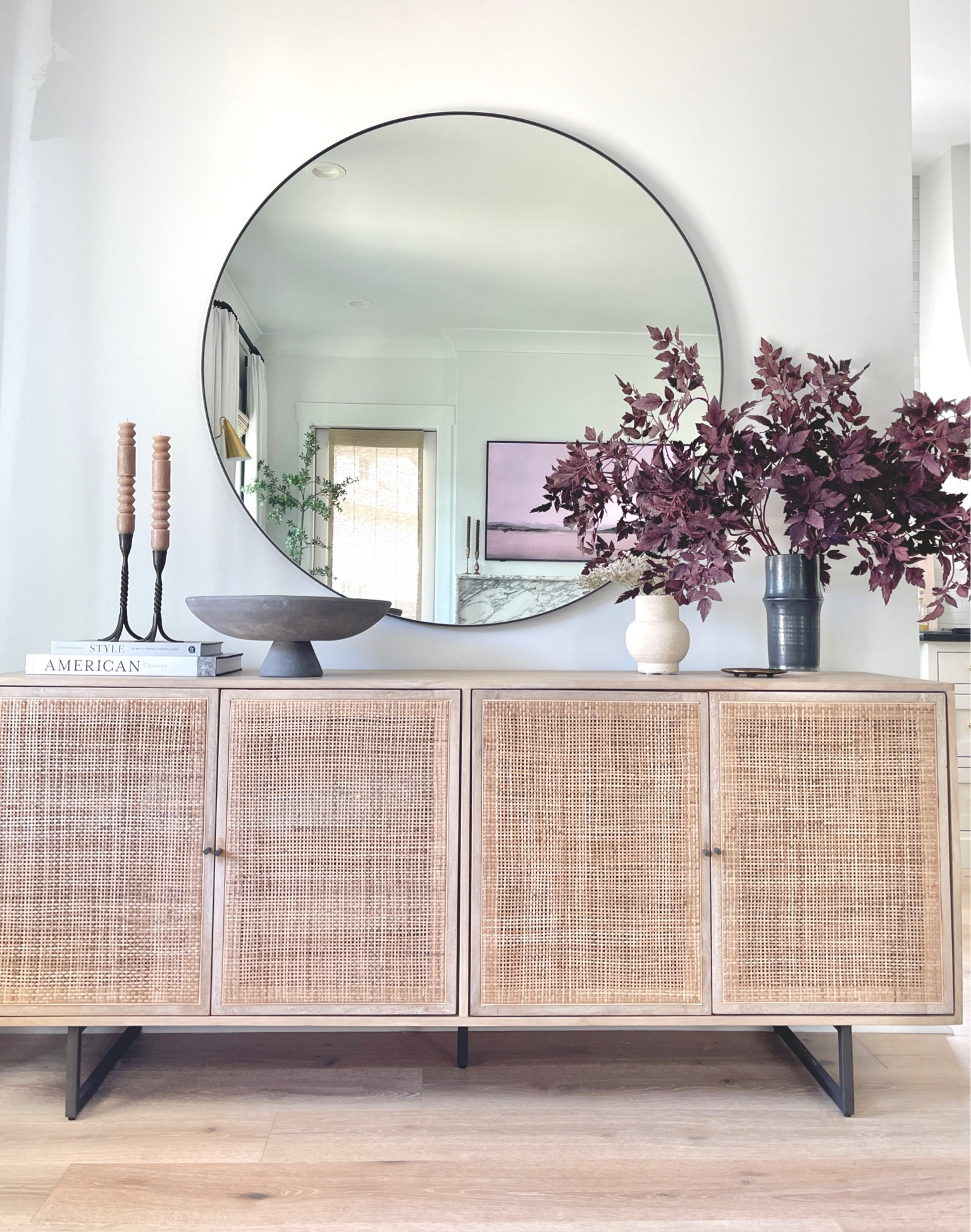 Entryway decor. Living room decor.  Cane buffet.  Round black mirror.  Home decor. Home accessories.  Shelf styling. Fall decor. Fall branches and stems.  Black vase 