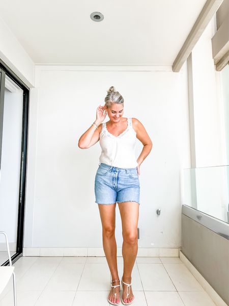 Vintage blue cut off denim shorts (size 31) and a beige satin cami top (one size) with lace trim paired with beige and gold sandals (tts). 



#LTKeurope #LTKtravel #LTKstyletip