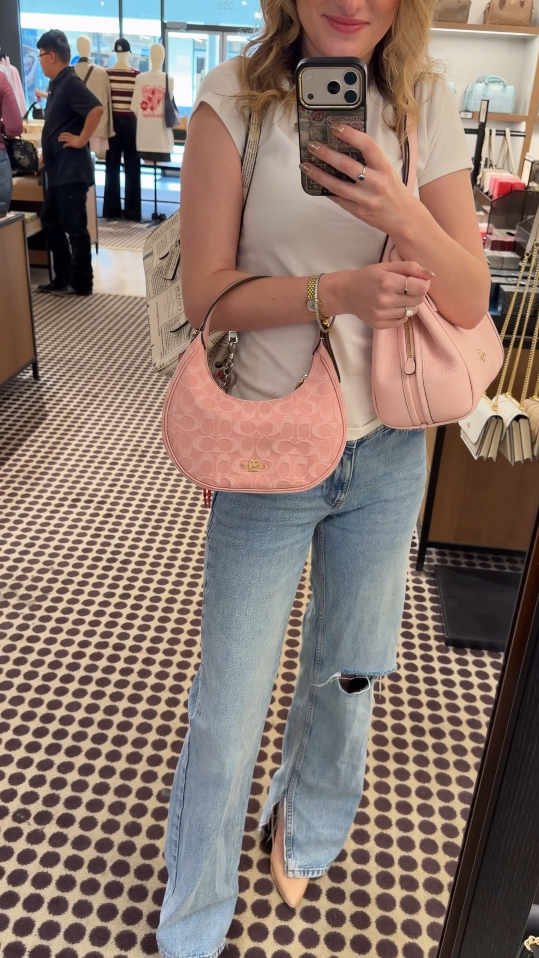 I went to check out the new Coach outlet drop for the highly anticipated pink denim bags 💗 I got there right after they opened and they were already out of so many pink denim pieces 😅 I did find a pink denim Emily, Carey, and Elodie bags which are still as of now in stock online too! 

My sales associate was able to find me one last pink denim mini Teri and mini Rowan charm.

I was originally there to get the red striped straw Teri with the cherry charm but ended up falling in love with both the straw city totes! Especially the one with the bear charm! The gingham was also a favorite! 

The pink Erin was also so cute and they had some straw Faye bags in every size.

I was loving the baby blue and tan combo of all of these bags as well 😍

Coach outlet 4/27 drop