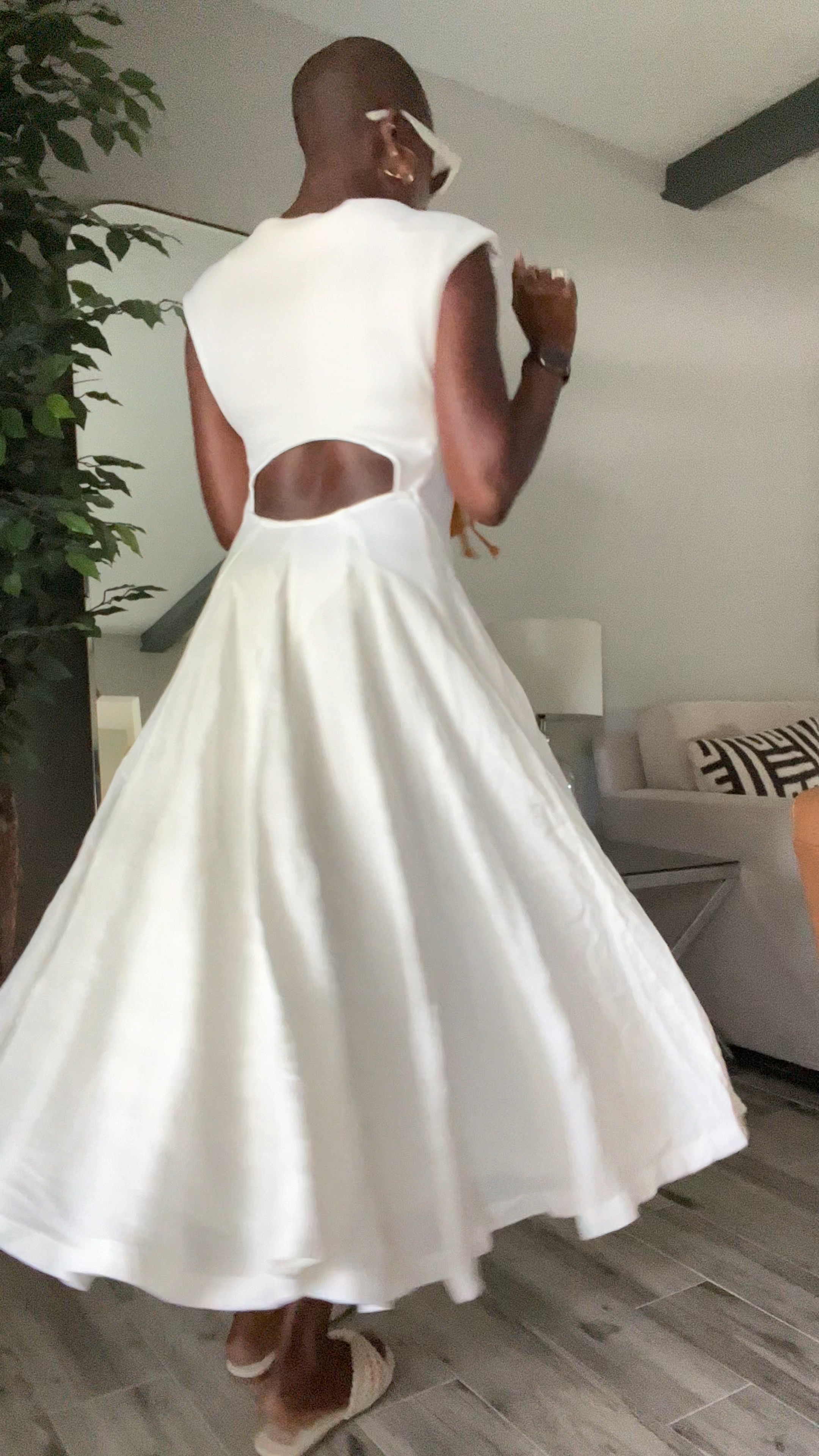 White sun dress with back cut out for summer! Stying with an orange purse, white square sunglasses and crochet sandals. Great for bridal activities! 

#LTKwedding #LTKunder100 #LTKtravel