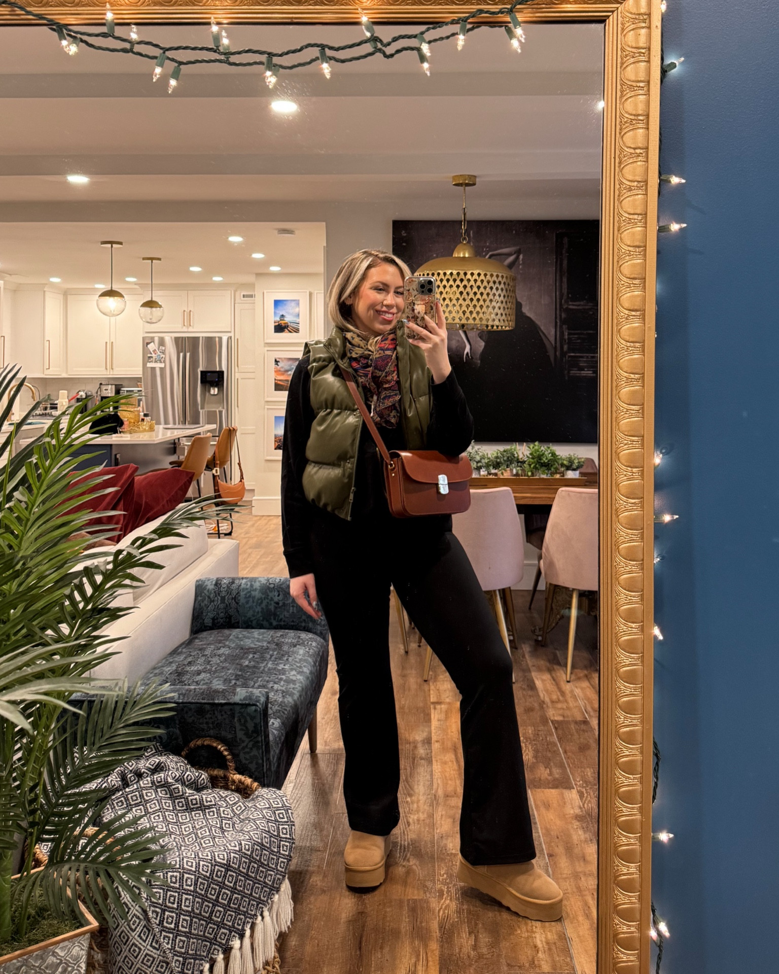 Vegan leather cropped puffer vest with sezane bag and American Eagle flare leggings yoga pants (wearing a large)

#LTKMidsize #LTKSeasonal #LTKStyleTip