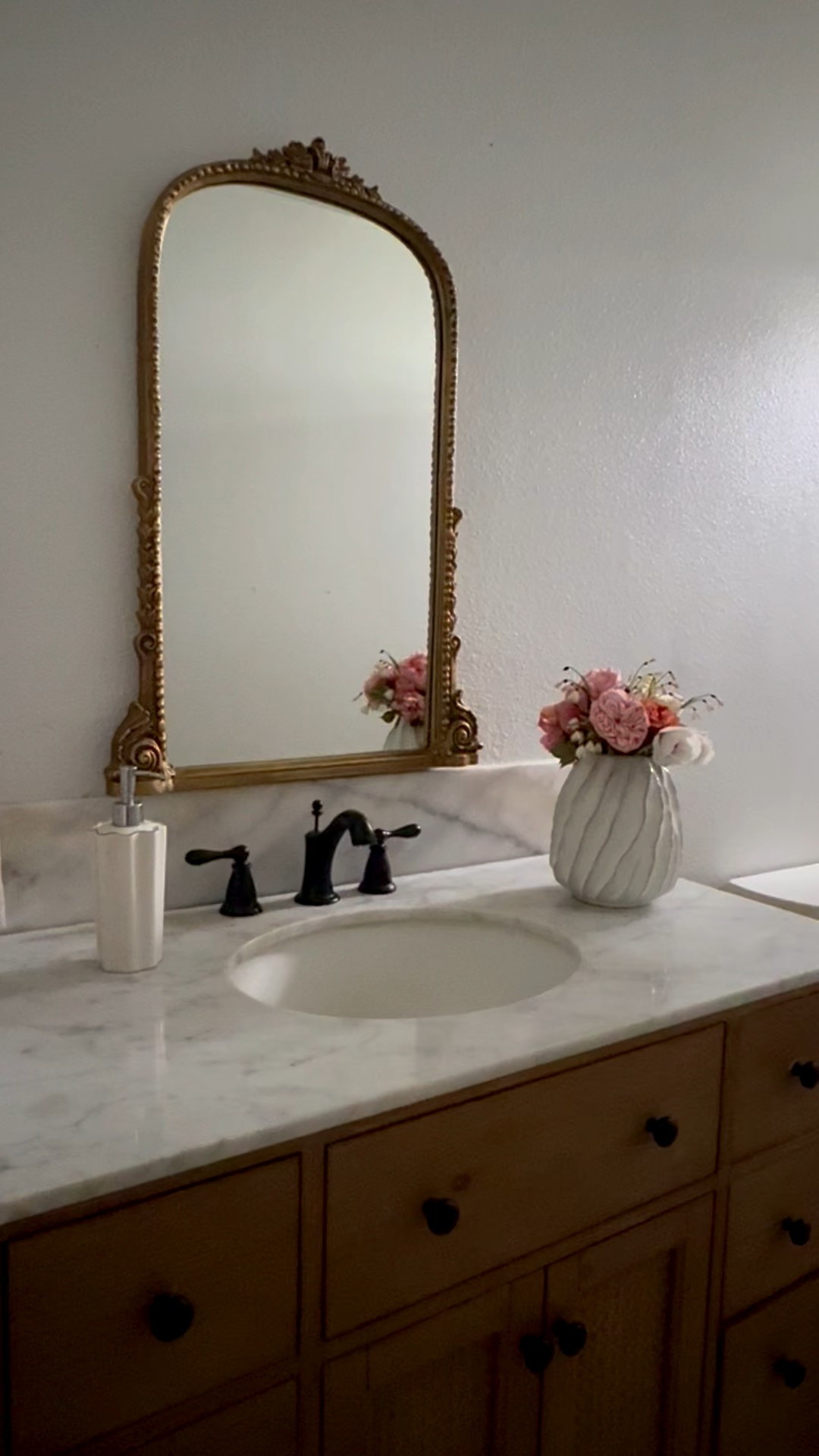My beautiful bathroom vanity from @Wayfair is on sale! Love it and this gorgeous ornate gold mirror! I also shared a link to my favorite natural stone and granite cleaner that I use to clean the marble top (of the vanity)! ❤️

#LTKHome #LTKSaleAlert #LTKmorningroutine