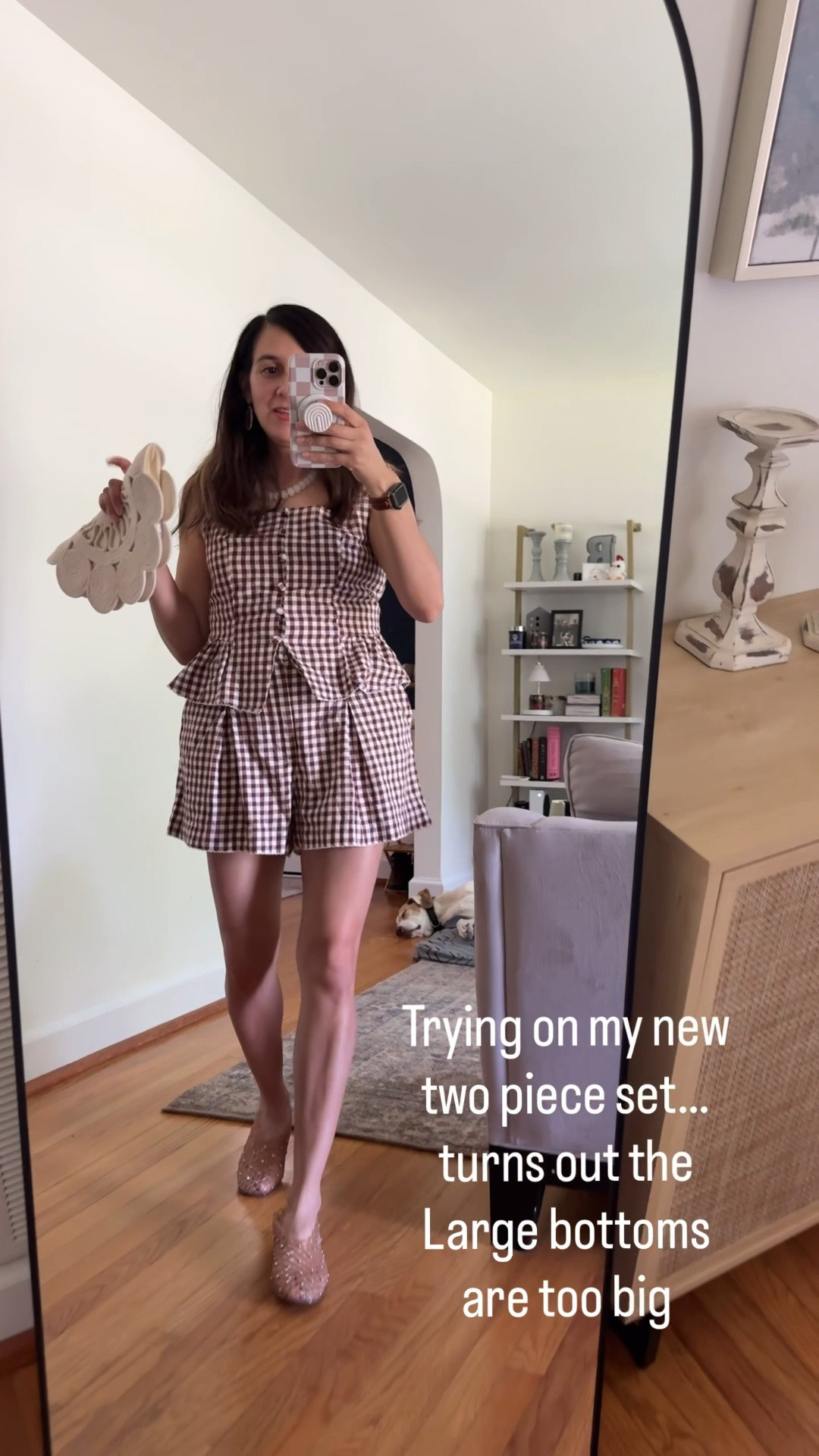 This gingham set from Target is one of those easy outfits that instantly looks put-together. The smocked gingham top and matching shorts are lightweight and comfortable, while the neutral accessories keep the look soft and timeless. I paired it with jelly ballet flats and a woven shell clutch for a romantic coastal-inspired vibe.

If you’ve been searching for:
• gingham matching sets for women
• cute summer two-piece outfits
• brown gingham outfit ideas
• feminine summer outfits
• casual vacation outfits
• lightweight summer sets for women in their 30s & 40s
• coastal summer style inspiration

Perfect for brunch, beach vacations, summer markets, weekend outings, or everyday summer errands ☀️

Save this for your next shopping day for summer 🤎

#LTKOver40 #LTKSeasonal #LTKootd