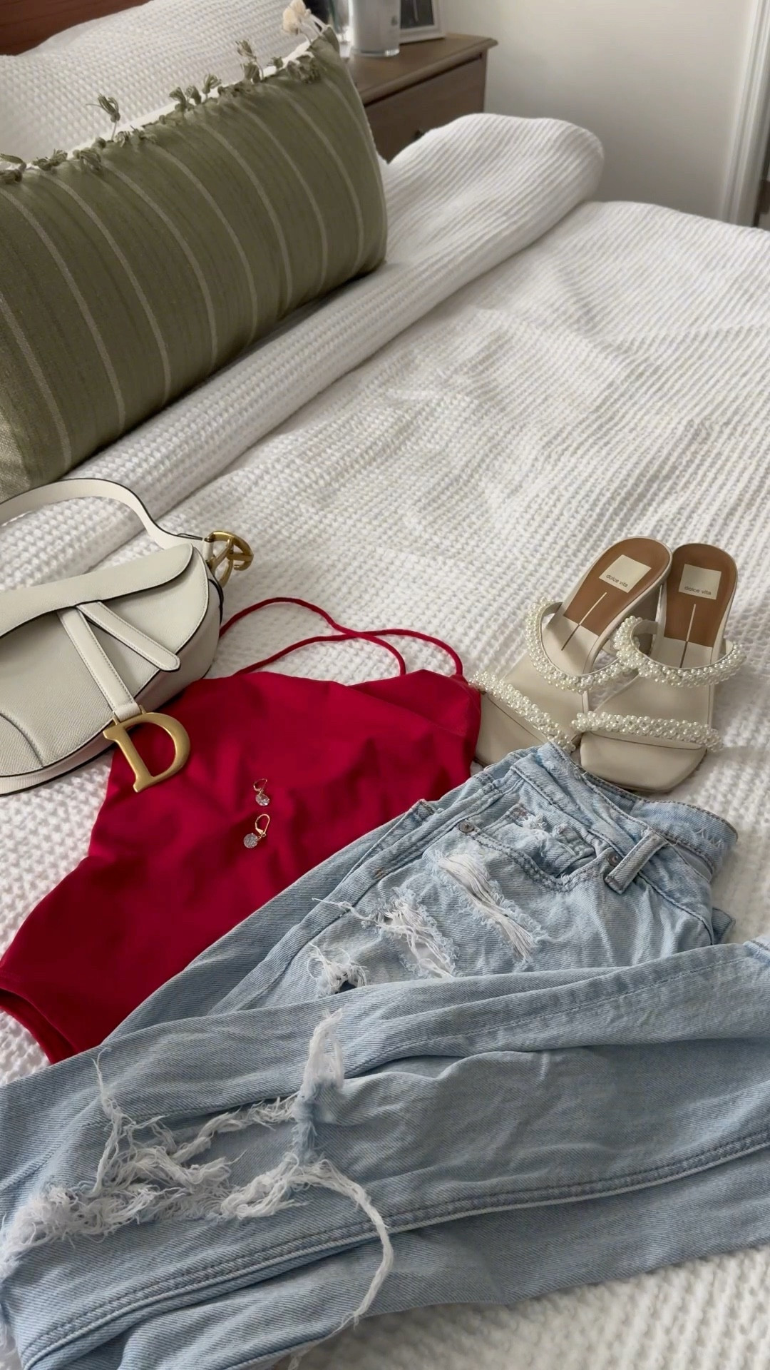 Red, ripped denim, and pearls because who says laid back can’t be luxe?✨ This strappy back moment pulls it all together.
#PearlHeels #StrappyBack #BoldAndFeminine #RedAndRipped #ChicCasual #WeekendLook #EffortlessStyle #DetailsMatter

#LTKParties #LTKShoeCrush #LTKItBag