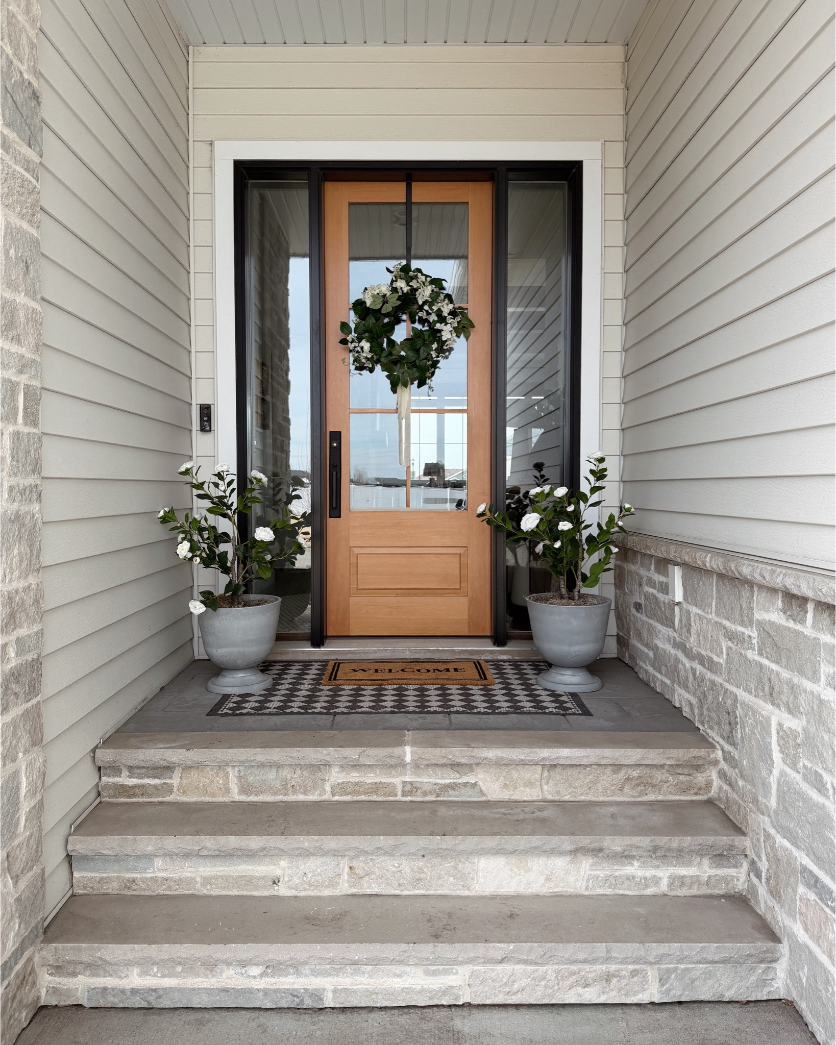 Here’s some minimal front porch inspo for you! Just waiting on the weather to warm up to layer in some real plants, but these faux plants work perfect for now!

#frontdoor #frontporch #frontporchdecor #spring #springflowers 

#LTKHome #LTKSeasonal