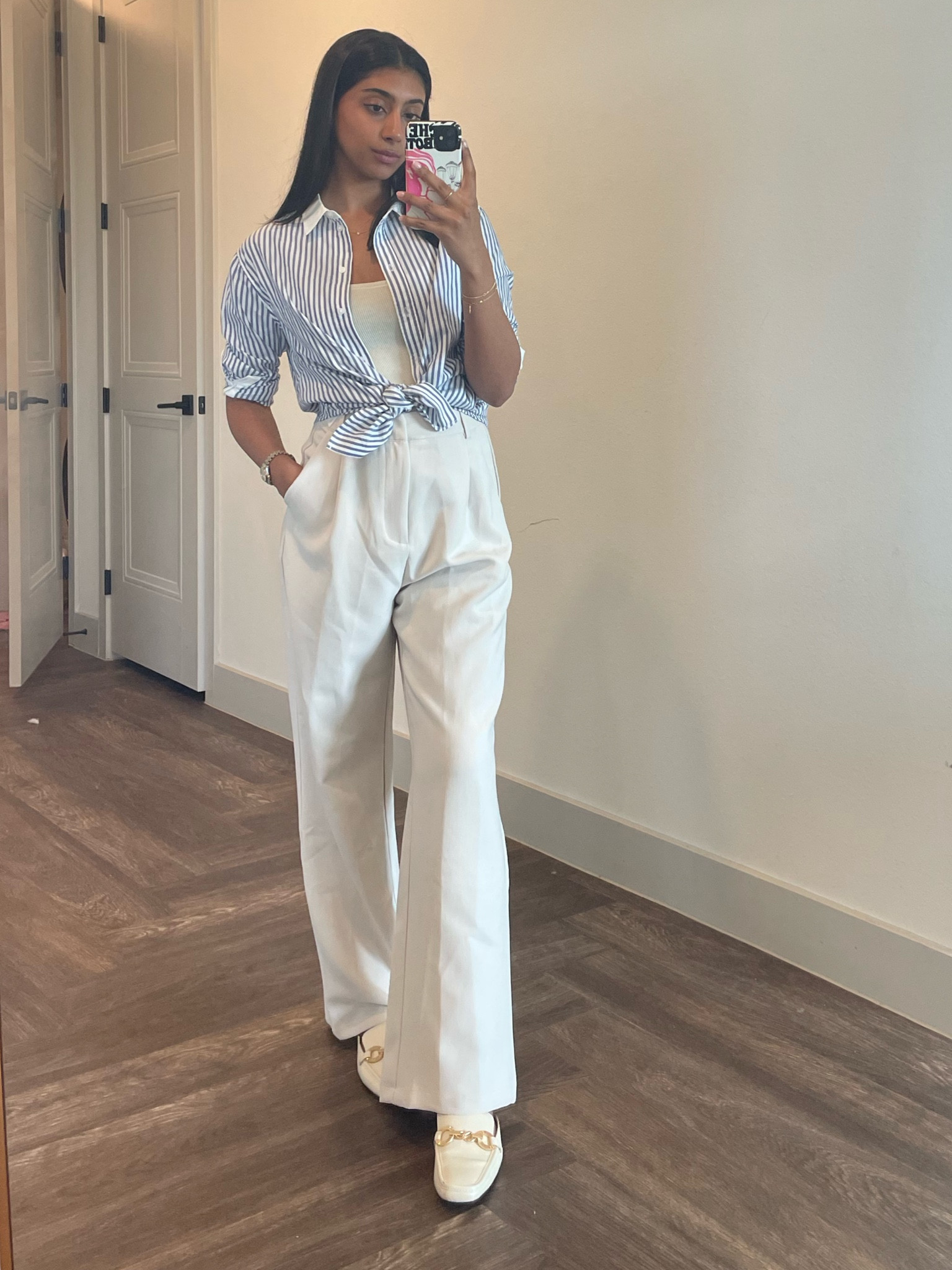 Perfect spring outfit! A blue and white striped button down, cream tank, relaxed white pants, and loafers ☁️

#LTKSeasonal #LTKstyletip #LTKworkwear