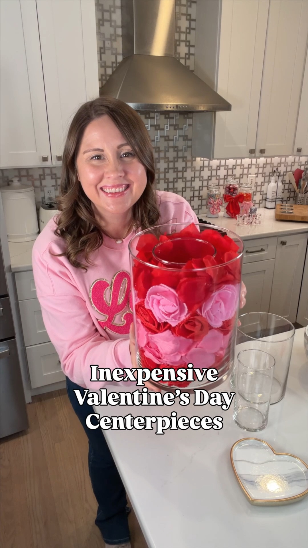 Inexpensive DIY Valentine’s Day centerpieces that look way more expensive than they are 💘✨

I found most of the supplies at the dollar store but will share everything else! Start by layering two vases together for the easiest elevated look. Inside the larger vase, I added faux roses + rose petals all the way to the top, then filled the inner vase with water 🌹🫶 For a fun twist, I did another version filled with candy hearts (cute and functional 😍).

The final touch? These gorgeous rose-shaped flameless LED floating candles that activate when they hit the water ✨🕯️—so magical for Valentine’s Day tables!

Perfect for Valentine’s dinners, Galentine’s nights, or a budget-friendly centerpiece that makes a big statement 💌

#LTKHome #LTKSeasonal #LTKDIY #ValentinesDecor #ValentinesCenterpiece #DollarStoreDIY #BudgetDecor #ValentinesInspo #HomeDecorIdeas #DIYDecor 💕

#LTKSeasonal #LTKHome #LTKdayinmylife