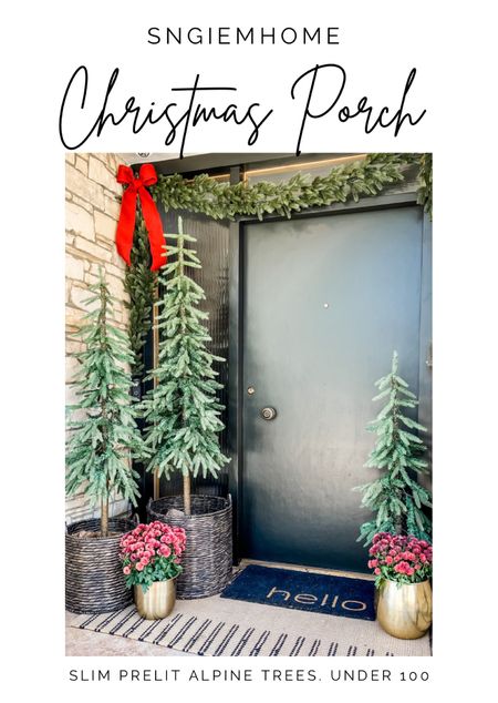 Create a festive holiday front porch with a few faux alpine trees placed in baskets.  Reused my mums from Fall decor..added some faux garlands around the doors and finish off with a bright red bow.#LTKCyberweek

#LTKstyletip #LTKhome