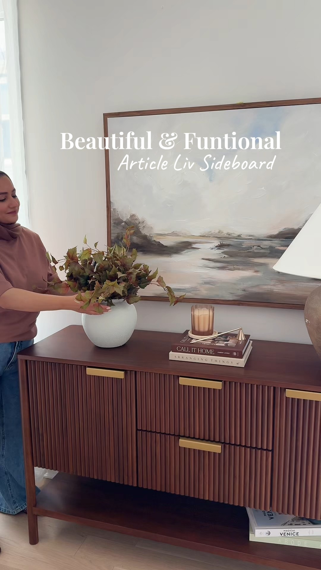 Recently added the Liv sideboard from @article to our space and I couldn’t be more happier. 
The rich, warm wood tones really complimented my light oak floors. The fluted details and the gold accents added such a nice and modern touch. 
What I love most is the amount of storage space this sideboard offers. I am able to store so many things. And the cherry on top has to be the soft close cabinets. Such a great feature. No loud slamming here! 

#ourarticle #sideboardstyling #functionalfurniture #ourarticle #sideboardstyling #LTKhome

#LTKcanada #LTKcasa